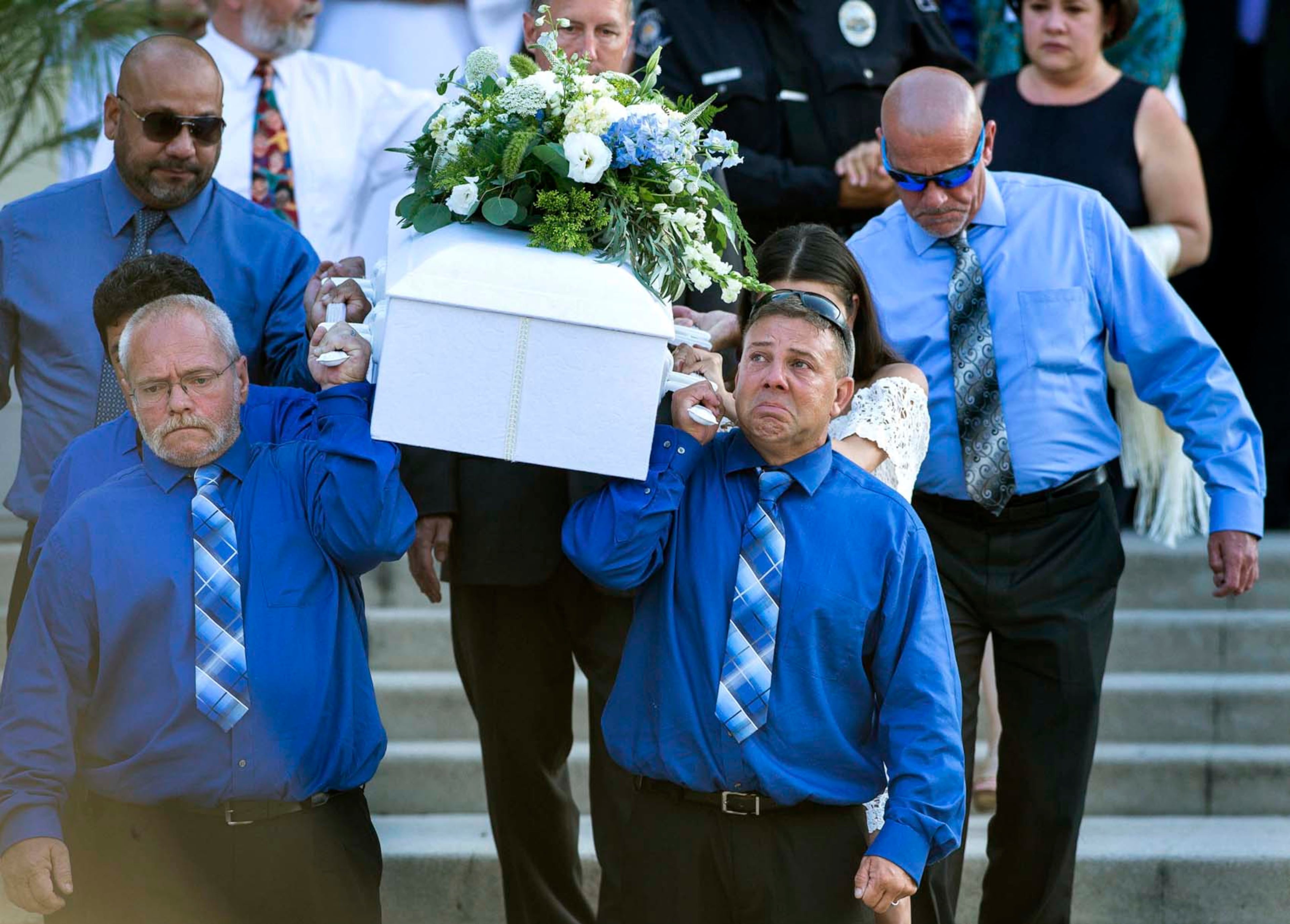 Pallbearers head to the hearse after Aramazd Andressian, Jr's funeral at Holy Family Roman Catholic Church in South Pasadena, Calif., on Tuesday, July 18, 2017. A funeral was held Tuesday for the 5-year-old Southern California boy whose father is charged with killing him after a trip to Disneyland. (Sarah Reingewirtz /Los Angeles Daily News via AP)
