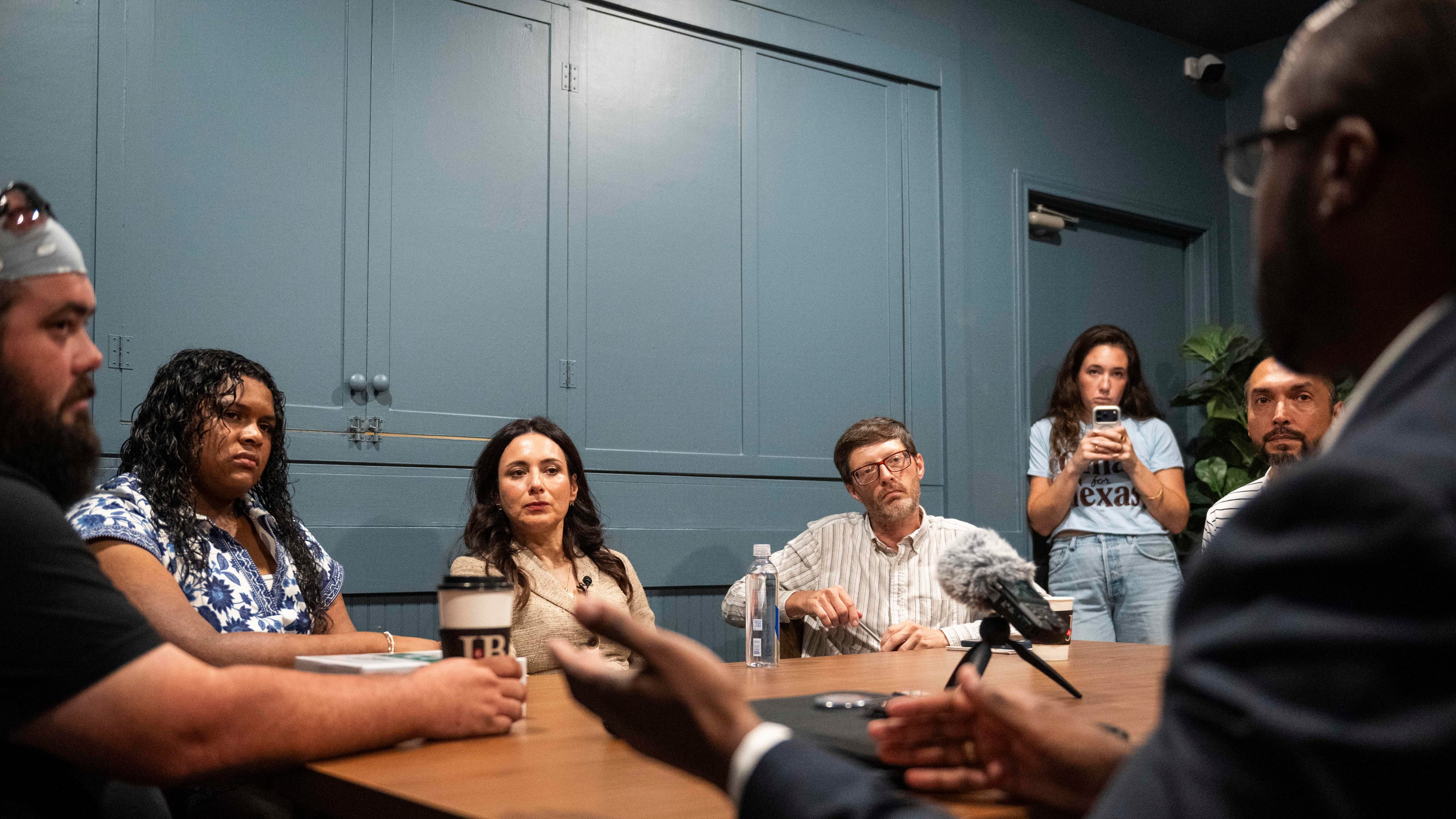 Democratic candidate for Texas governor Gina Hinojosa, third from the left, listens to Stephen Sanders, right, during a roundtable discussion on data centers, Saturday, July 18, 2026, in Lubbock, Texas. (AP Photo/Justin Rex)