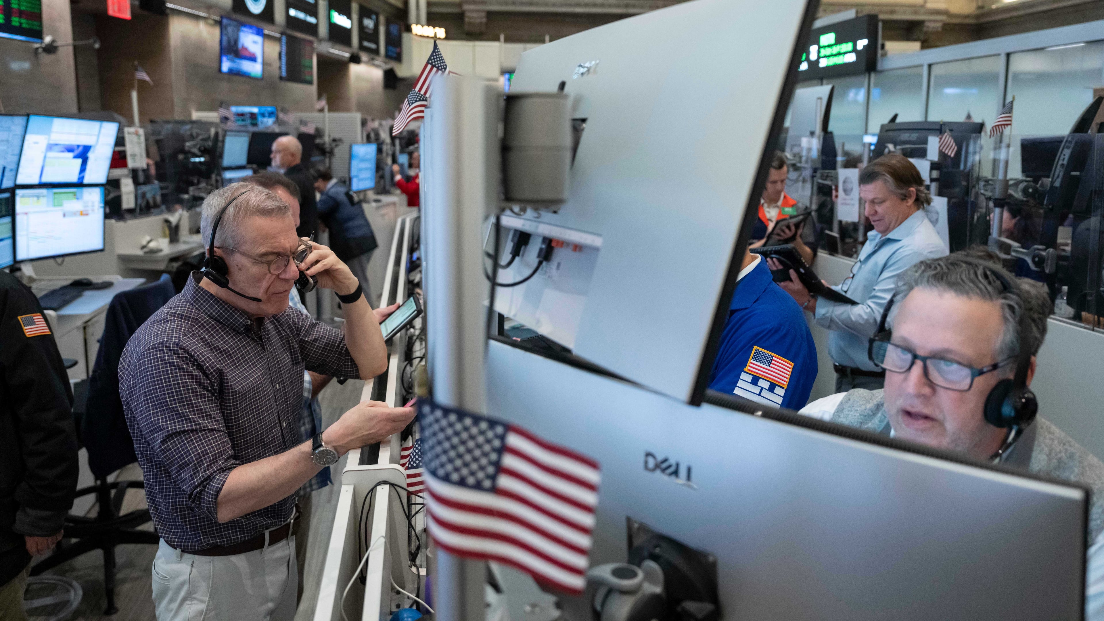 Options traders work on the floor of the New York Stock Exchange, Thursday, Oct. 8, 2026, in New York. (AP Photo/Yuki Iwamura)