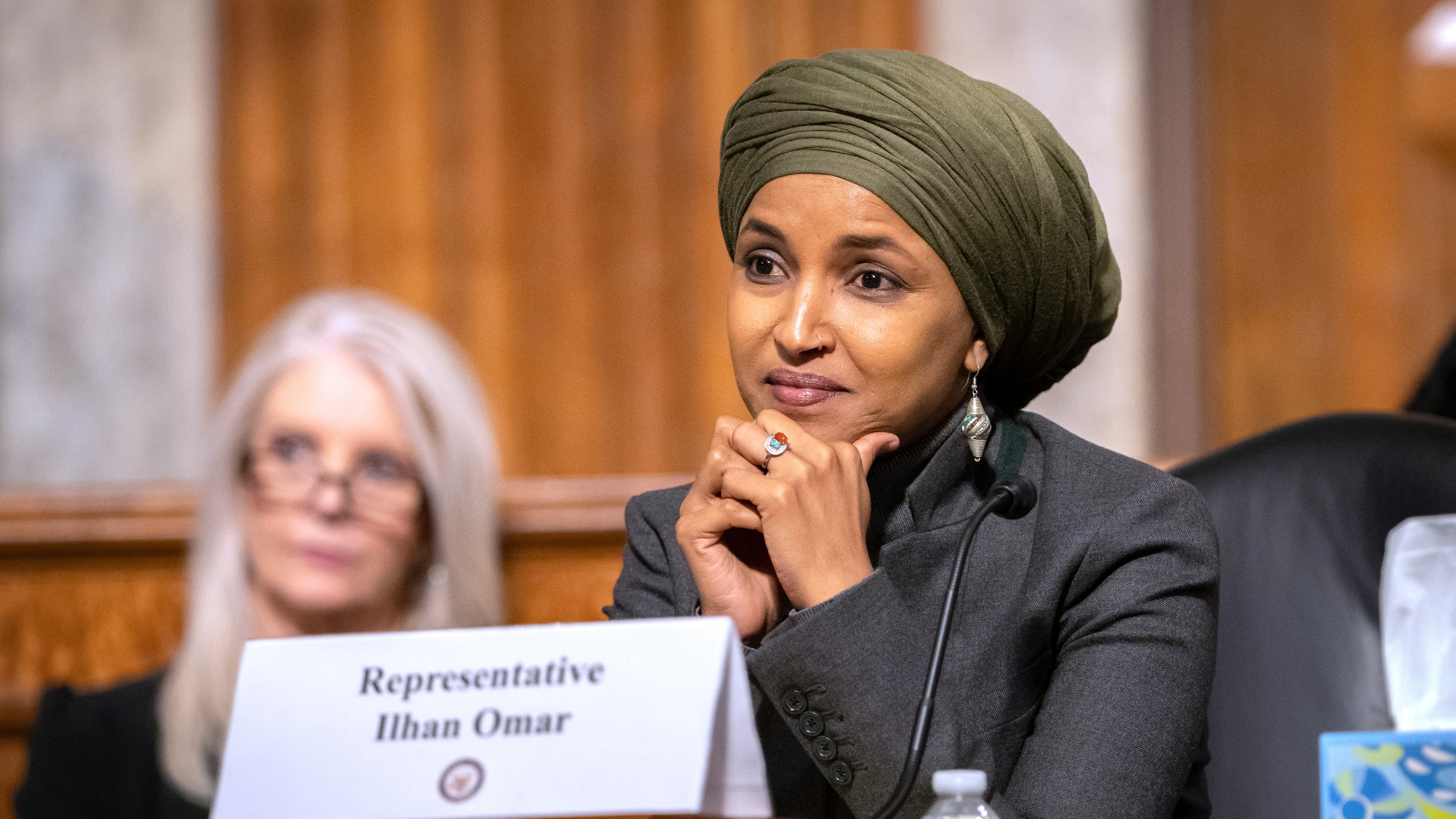 FILE - Rep. Ilhan Omar, D-Minn., listens during a Congressional spotlight hearing on Capitol Hill, Sept. 22, 2026, in Washington. (AP Photo/Mark Schiefelbein, File)