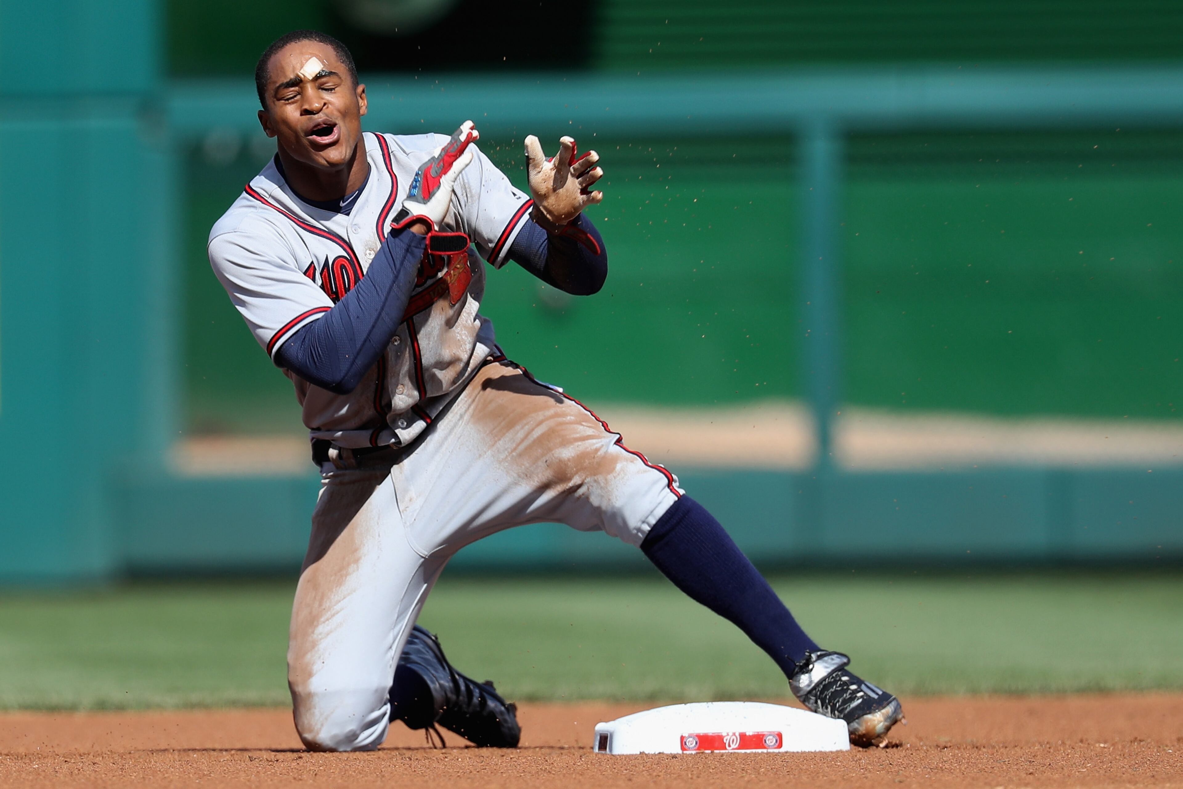 Mallex Smith #17 of the Atlanta Braves reacts after being called out trying to steal second base against the Washington Nationals in the first inning at Nationals Park on April 14, 2016 in Washington, DC. (Photo by Rob Carr/Getty Images)