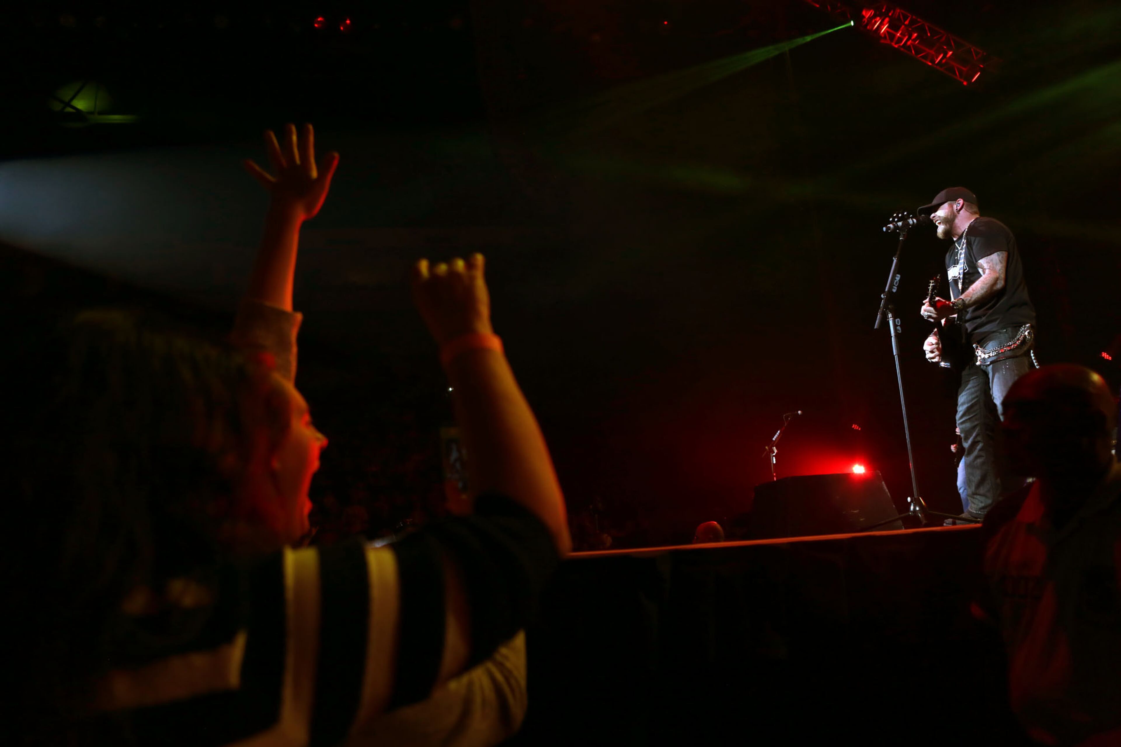 Nov. 28, 2014 DULUTH: Fans of Brantley Gilbert show their enthusiasm as he performs his Let It Ride tour at the Arena at Gwinnett Center. (Akili-Casundria Ramsess/Special to the AJC)