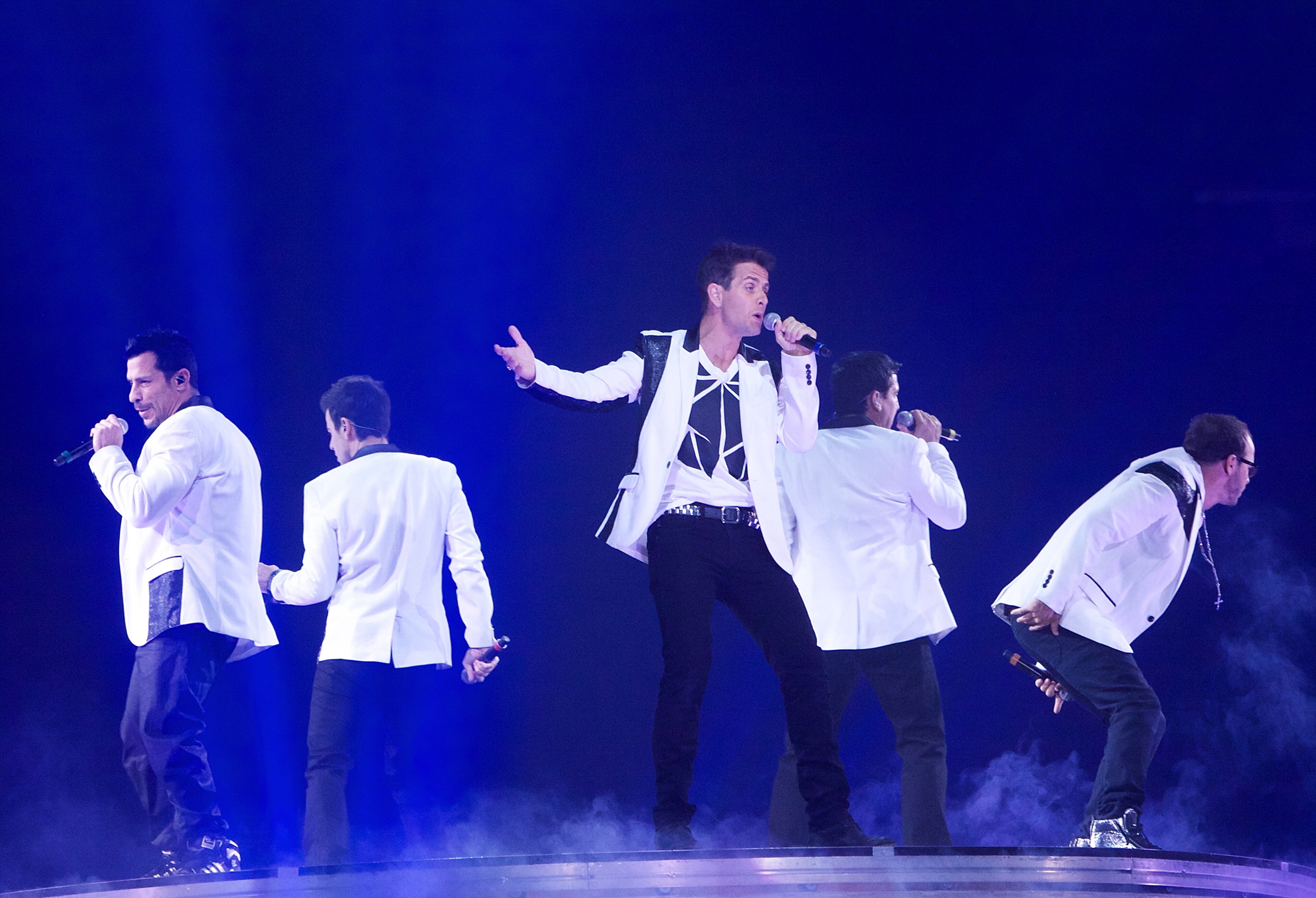 (L-R) Danny Wood, Jordan Knight, Joey McIntyre, Jonathan Knight and Donnie Wahlberg of New Kids On The Block perform at Allstate Arena on July 18, 2013 in Rosemont, Illinois.