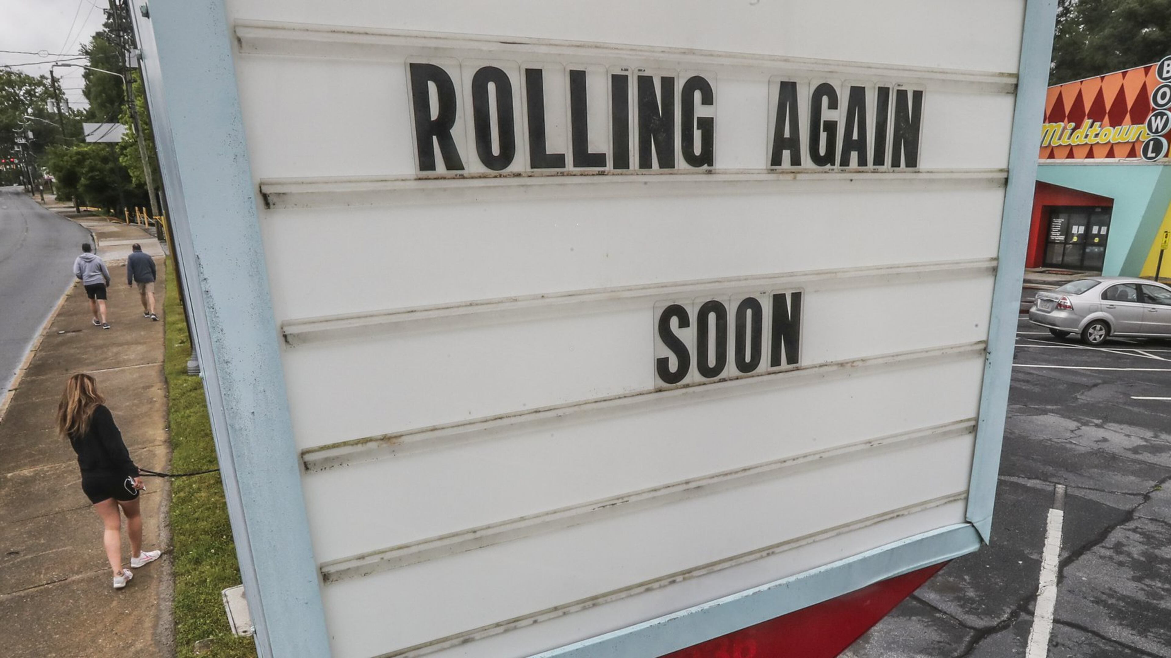 A sign at an Atlanta business on Thursday, April 23, 2020. JOHN SPINK/JSPINK@AJC.COM