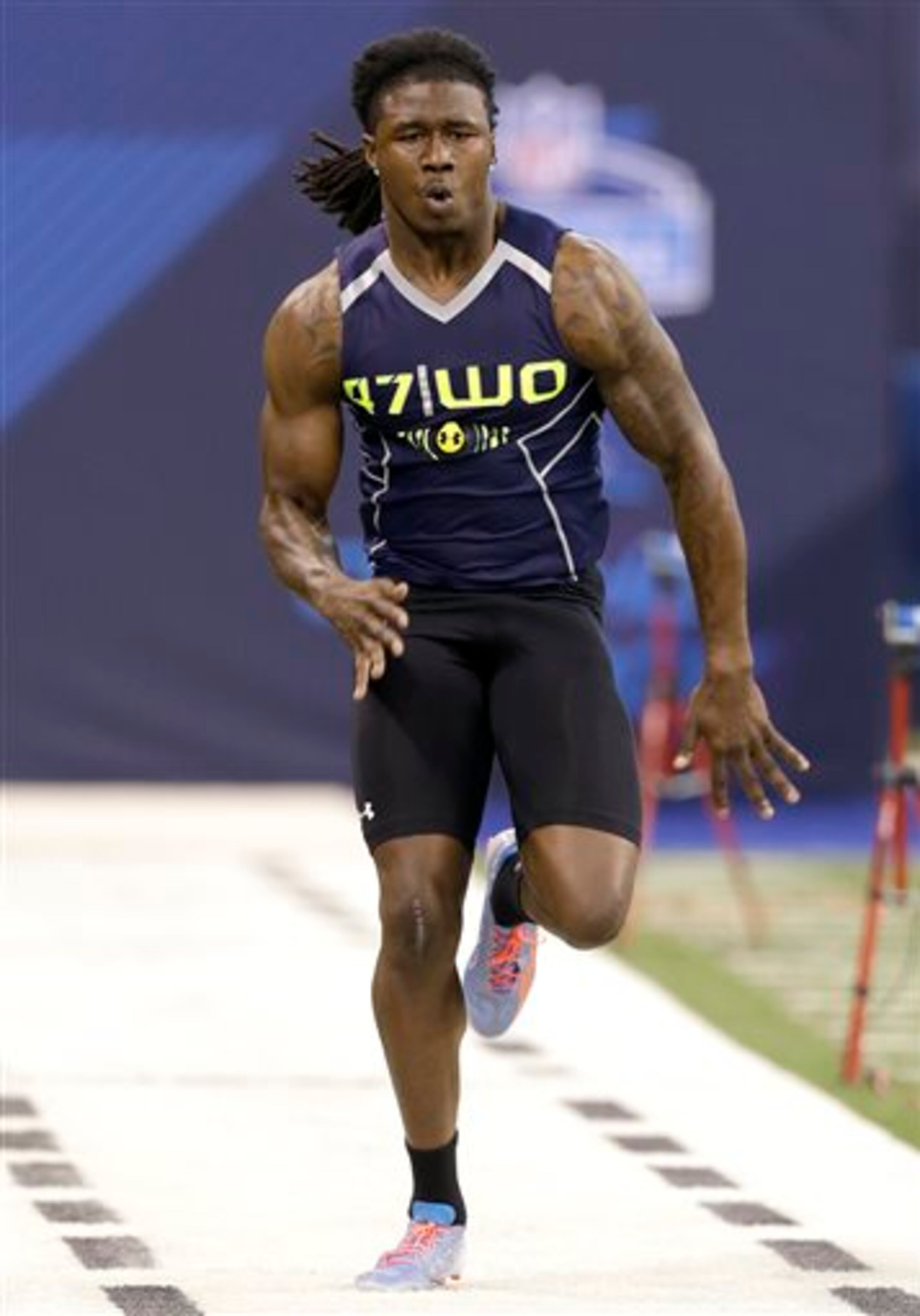 Clemson wide receiver Sammy Watkins runs the 40-yard dash at the NFL football scouting combine in Indianapolis, Sunday, Feb. 23, 2014. (AP Photo/Nam Y. Huh)
