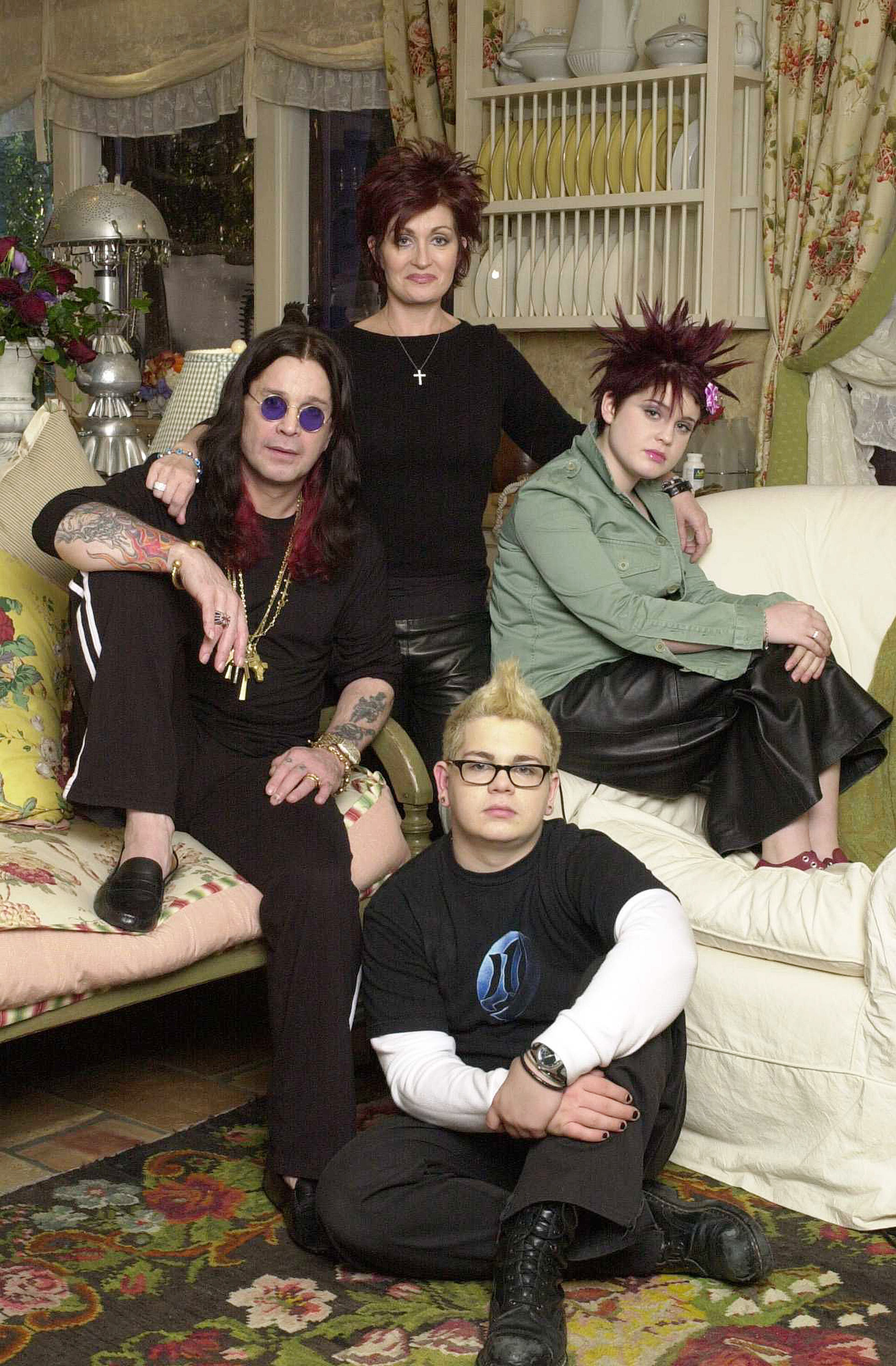The Osbournes, Ozzy (left), Sharon, Jack, and Kelly are shown in this undated photo. MTV officials said March 4, 2002, that Ozzy Osbourne, the heavy metal rock star and his family are the subject of a new MTV series, "The Osbournes."