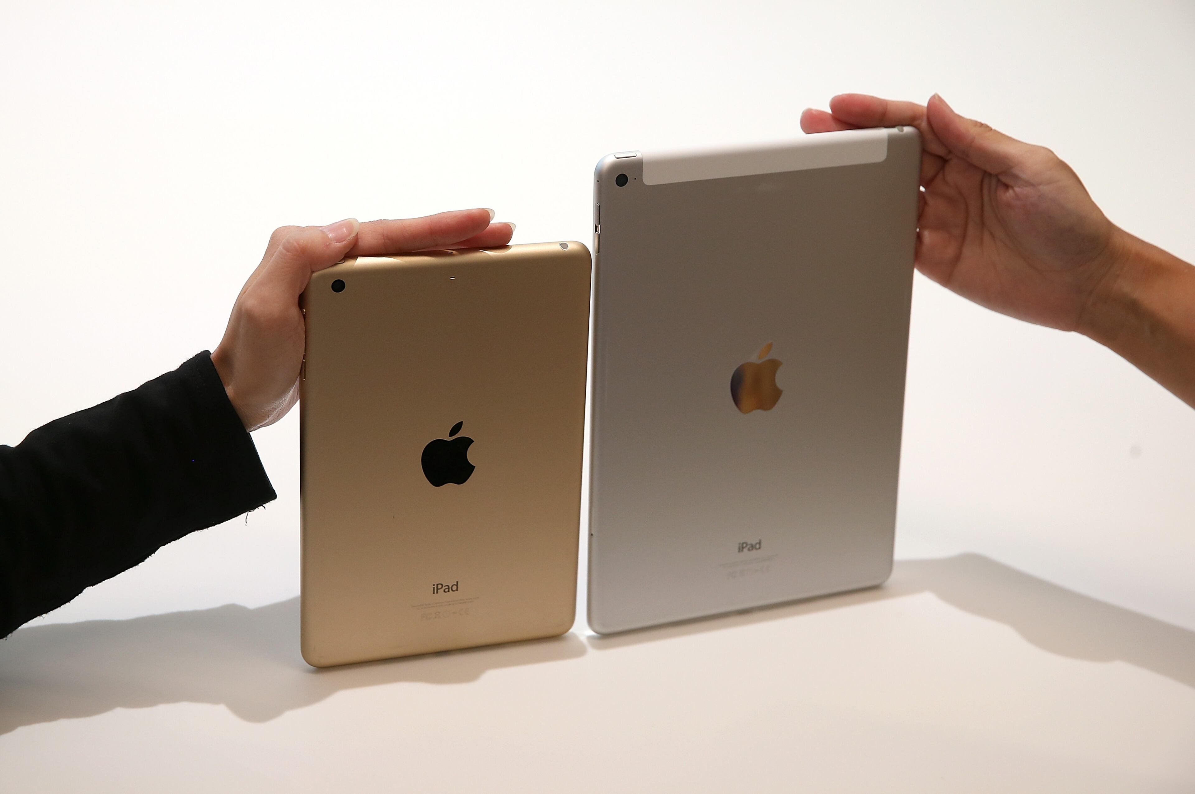 CUPERTINO, CA - OCTOBER 16: The new iPad Air 2 (R) and iPad Mini 3 are displayed during an Apple special event on October 16, 2014 in Cupertino, California. Apple unveiled the new iPad Air 2 and iPad Mini 3 tablets and the iMac with 5K retina display. (Photo by Justin Sullivan/Getty Images)