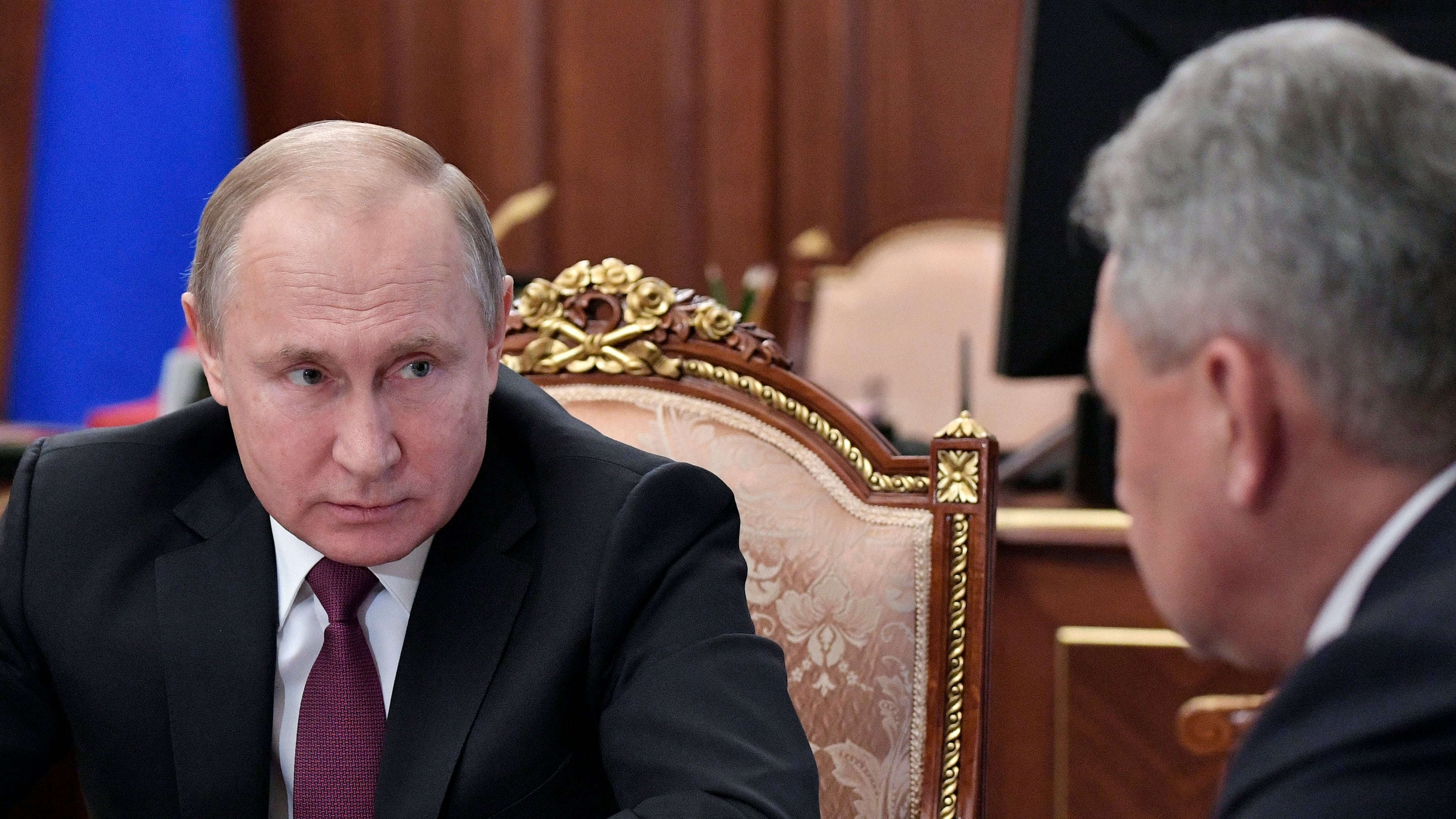 Russian President Vladimir Putin, left, speaks to Defense Minister Sergei Shoigu during a meeting in the Kremlin in Moscow, Russia, Saturday, Feb. 2, 2019. Putin said that Russia will abandon the 1987 Intermediate-Range Nuclear Forces treaty, following in the footsteps of the United States, but noted that Moscow will only deploy intermediate-range nuclear missiles if Washington does so. (Alexei Nikolsky, Sputnik, Kremlin Pool Photo via AP)