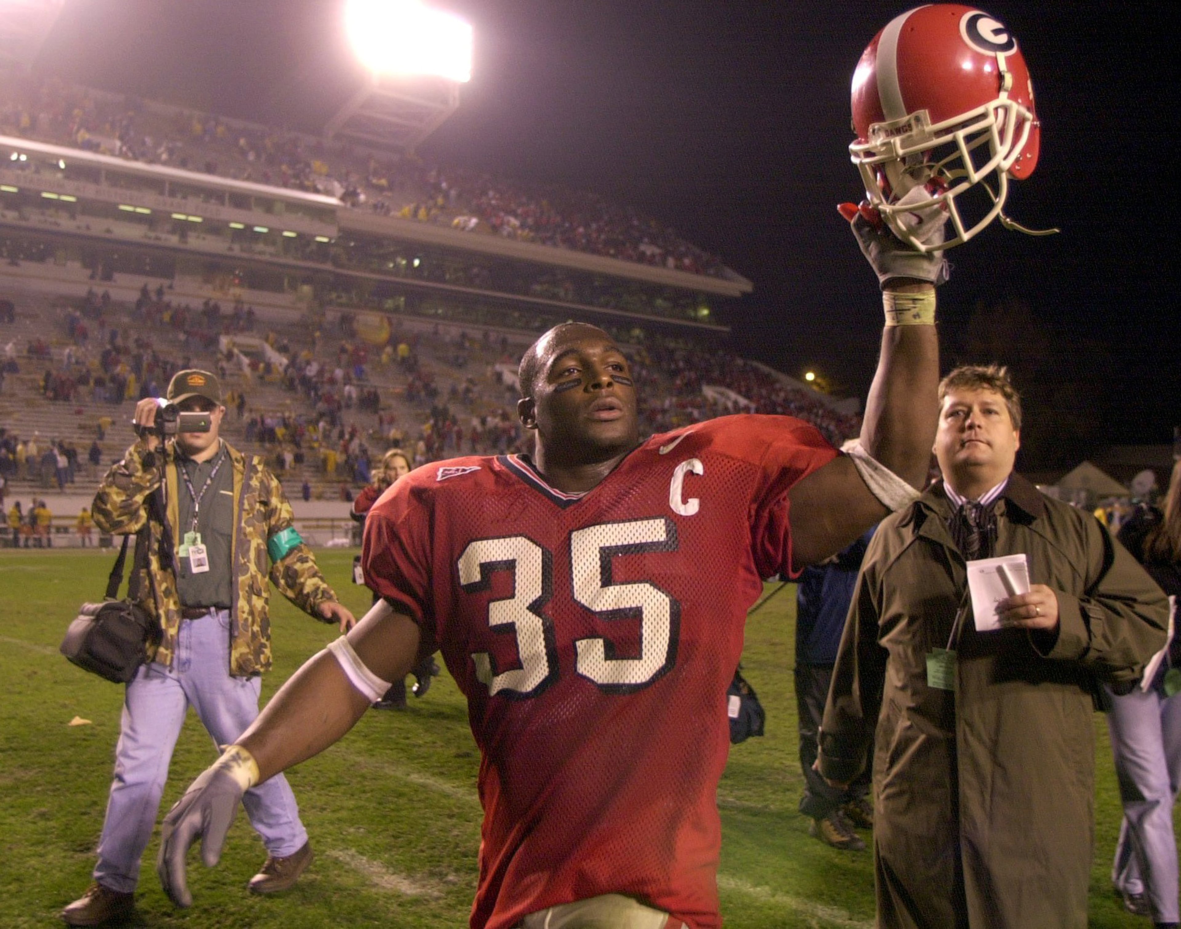 Georgia star Verron Haynes celebrates after beating Georgia Tech in 2001. (Brant Sanderlin/AJC)
