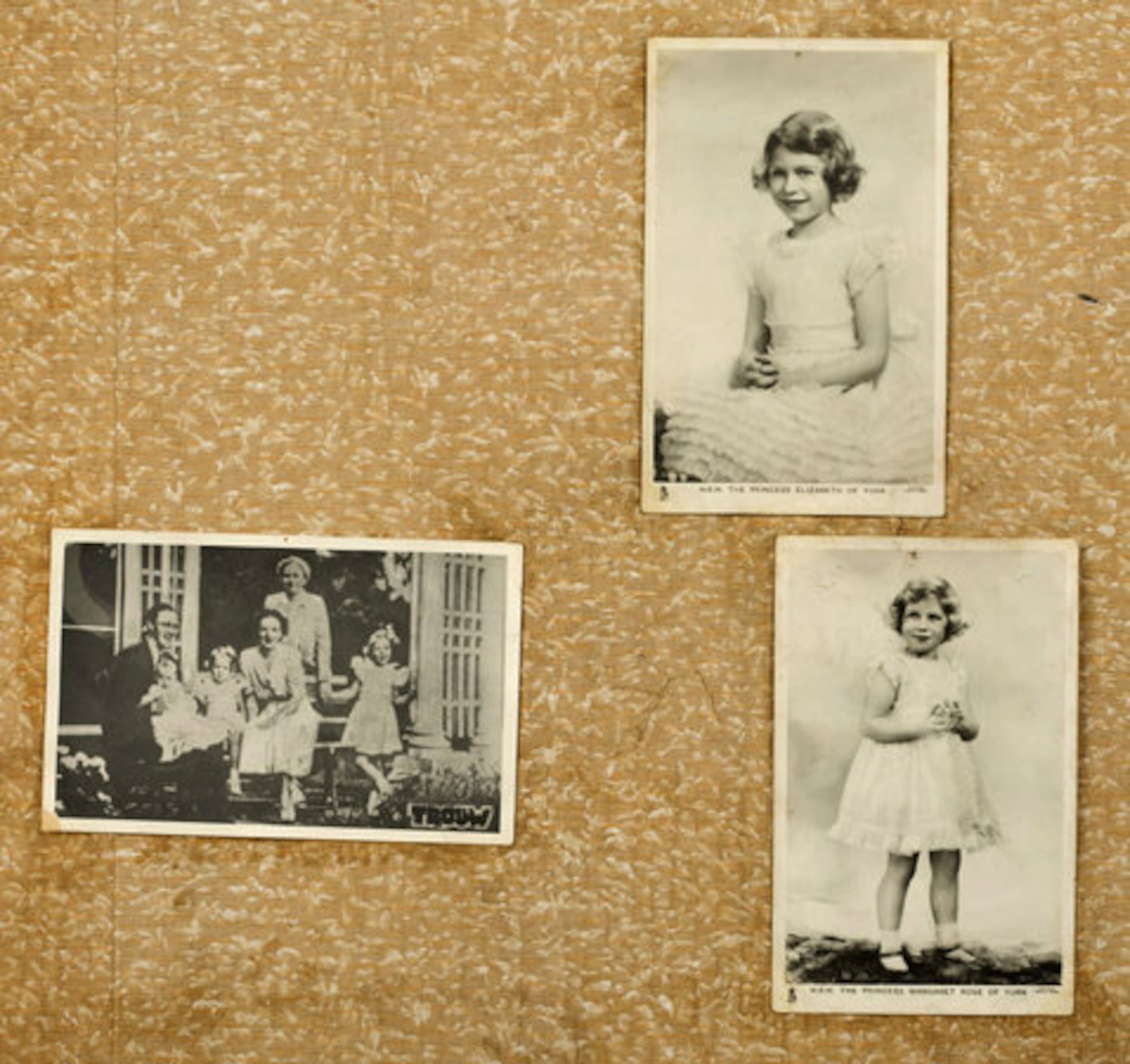 Postcards of Britain's Queen Elizabeth, top right, Princess Margaret, bottom right and a 1943 photo of the Dutch Royal family in exile in Ottawa, Canada, are seen on the wall above Anne Franks' desk, in The Secret Annex at the Anne Frank House museum. Spokeswoman Annemarie Bekker says it has restored 52 photographs of celebrities that the Jewish teenager pasted on the wall of her room to cheer herself up while in hiding from the Nazis during World War II.
