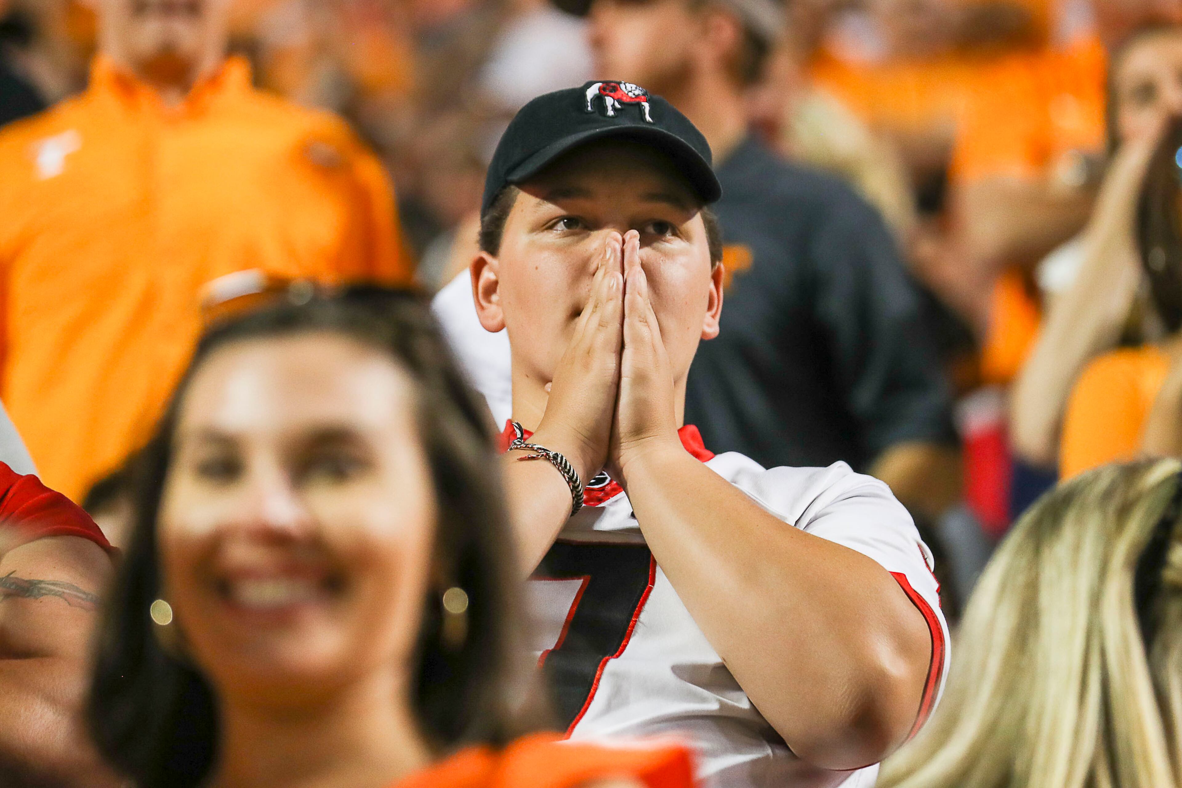 A Georgia Bulldogs fan reacts to the game. (Alyssa Pointer/Atlanta Journal Constitution)