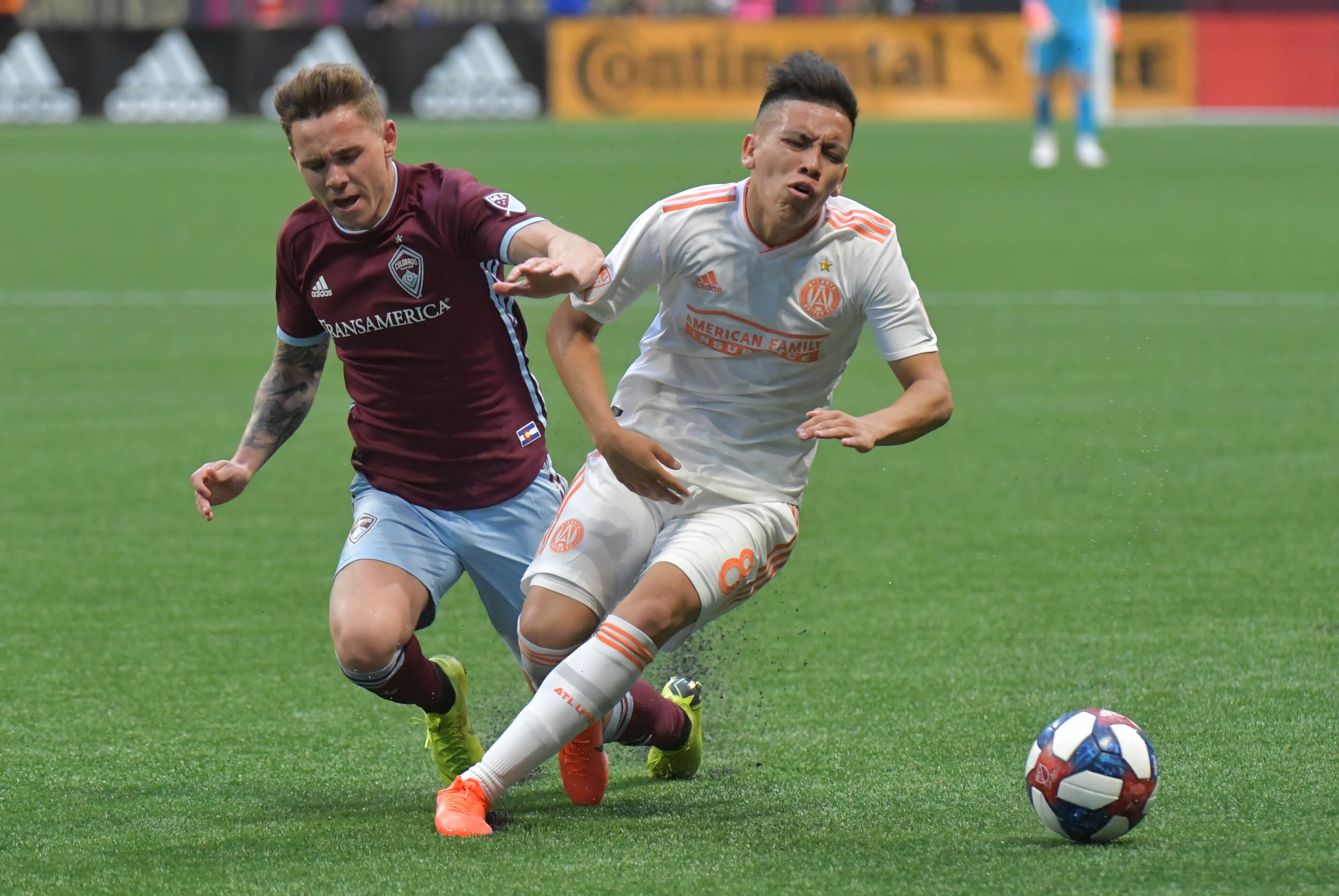 April 27, 2019 Atlanta - Atlanta United midfielder Ezequiel Barco (8) gets tackled by Colorado Rapids midfielder Sam Nicholson (28) during the second half in a MLS soccer match at Mercedes-Benz Stadium in Atlanta on Saturday, April 27, 2019. Atlanta United won 1-0 over the Colorado Rapids. HYOSUB SHIN / HSHIN@AJC.COM