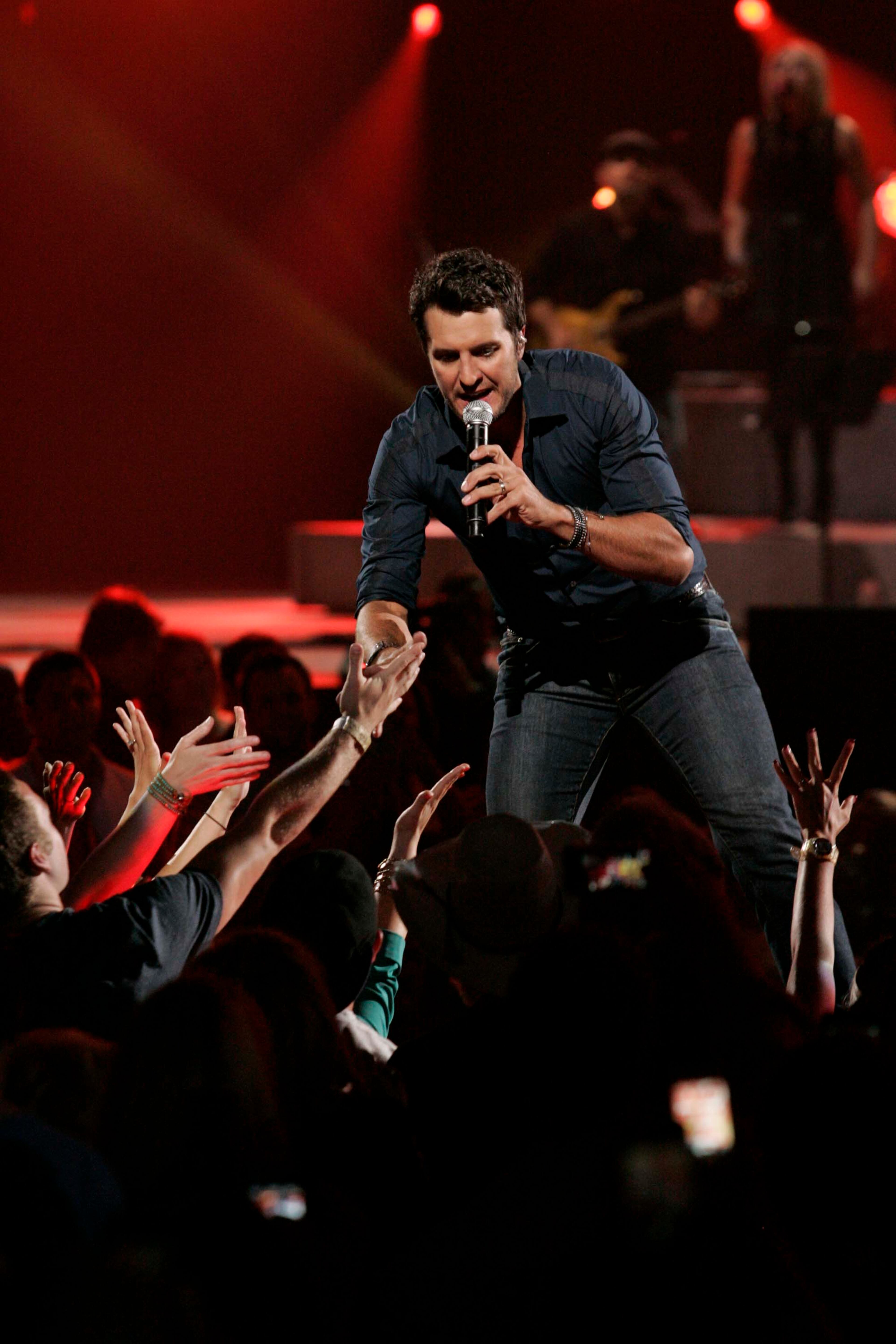 Luke Bryan during the Healing in the Heartland: Relief Benefit Concert at the Chesapeake Energy Arena in Oklahoma City, Okla., Wednesday, May 29,2013. Funds raised by the benefit will go to the United Way of Central Oklahoma, for recovery efforts for those affected by the May 20 tornado. (AP Photo/NBC, Brett Deering)