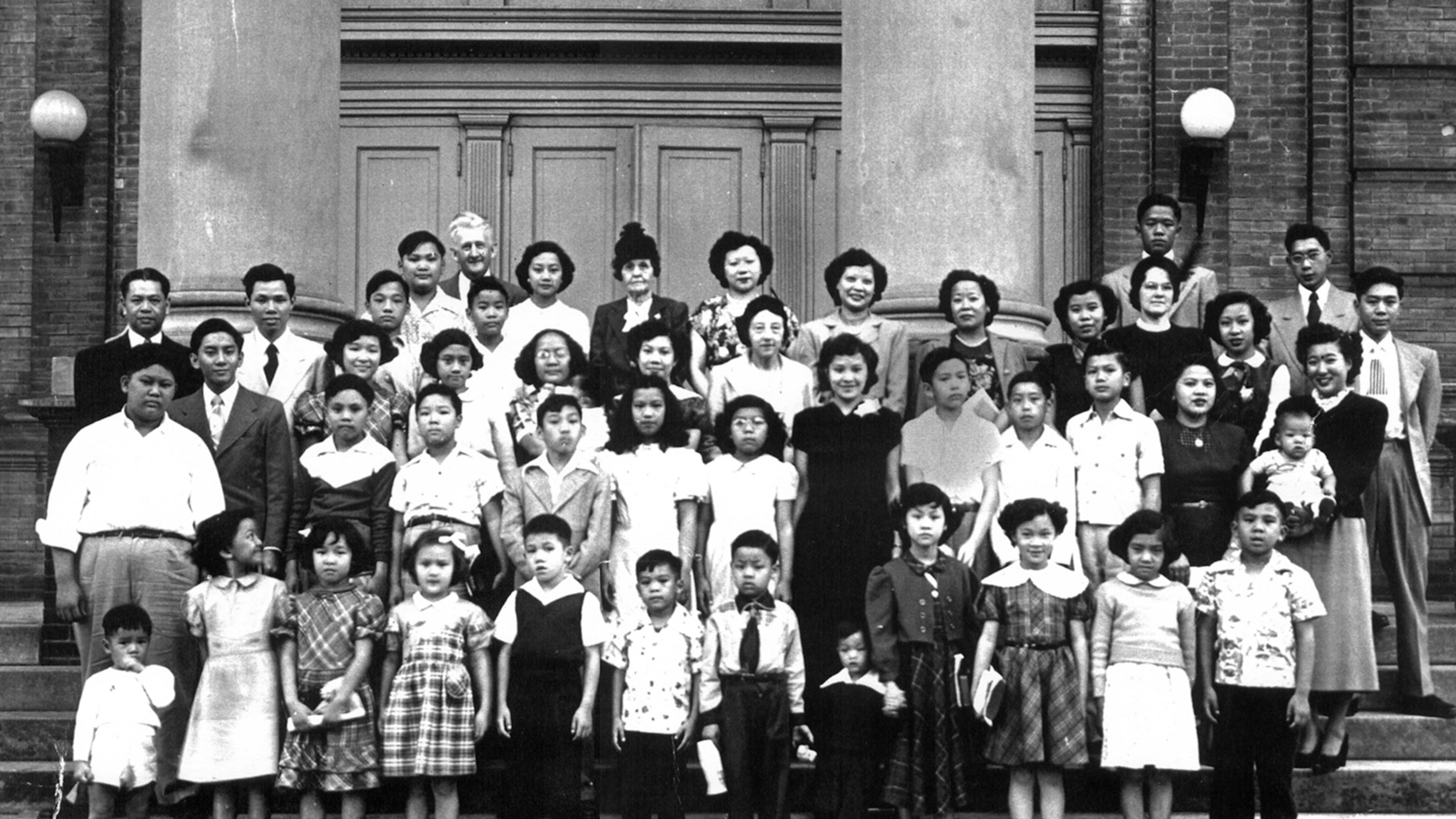 Members of a Chinese Sunday School take a group portrait in front of First Baptist Church in Augusta in the 1950s. Ray Rufo, former president of Augusta’s Chinese Consolidated Benevolent Association, is on the far upper right in glasses. Paul Jue, at far left, was one of the first Chinese American deacons in the Southeast. (Courtesy of the Chinese Consolidated Benevolent Association of Augusta)