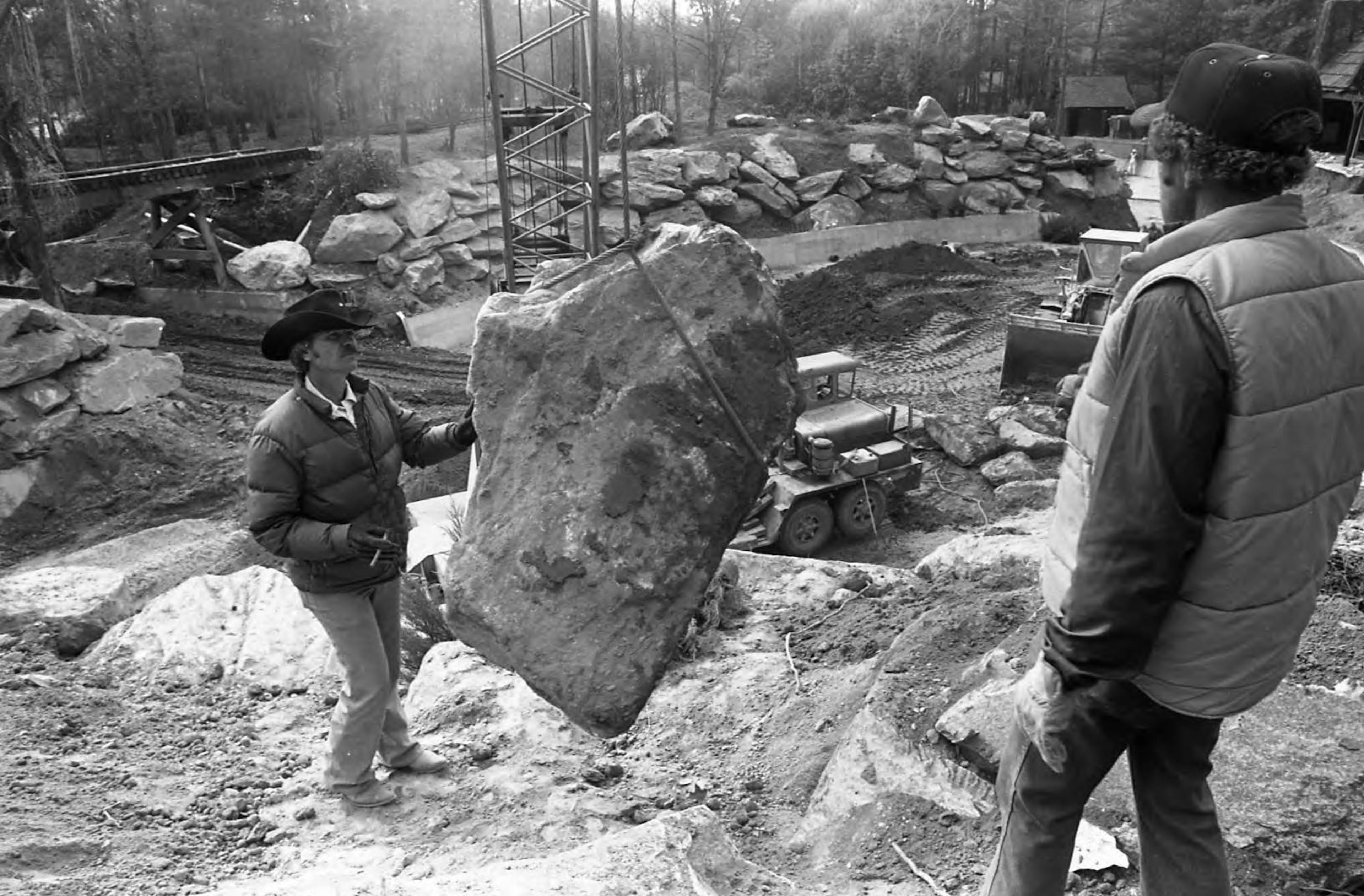 Construction workers discuss the site for the Thunder River amusement ride at Six Flags Over Georgia on February 25, 1982.