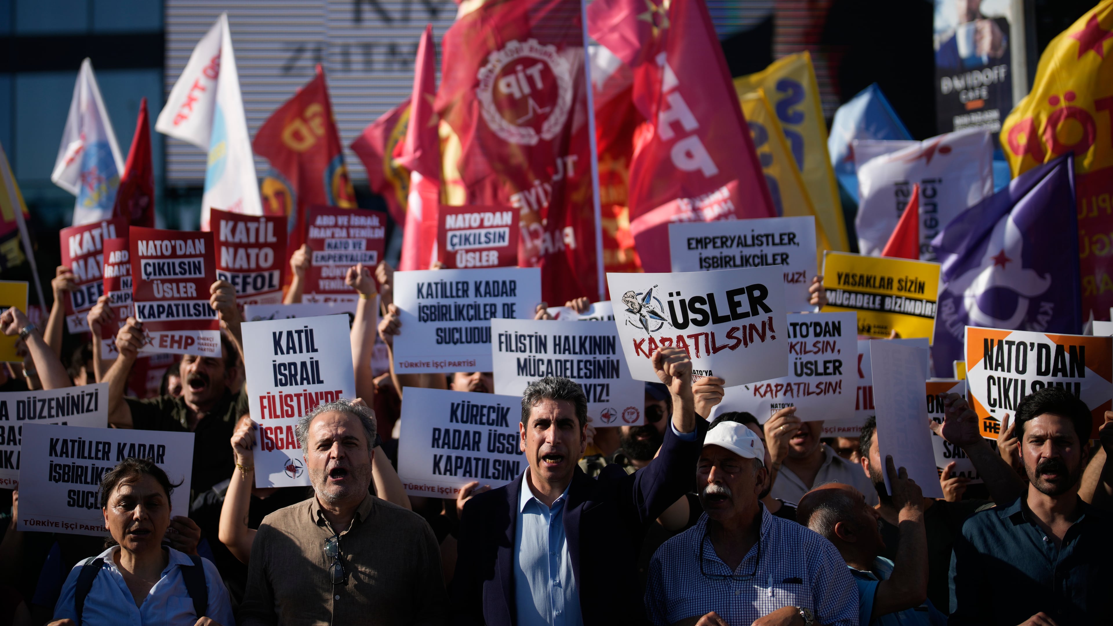 Demonstrators chant slogans and raise placards, during an anti-NATO protest in Istanbul, Turkey, Saturday, June 27, 2026, days ahead of the NATO summit scheduled to be held in Ankara on July 7-8.(AP Photo/Khalil Hamra)