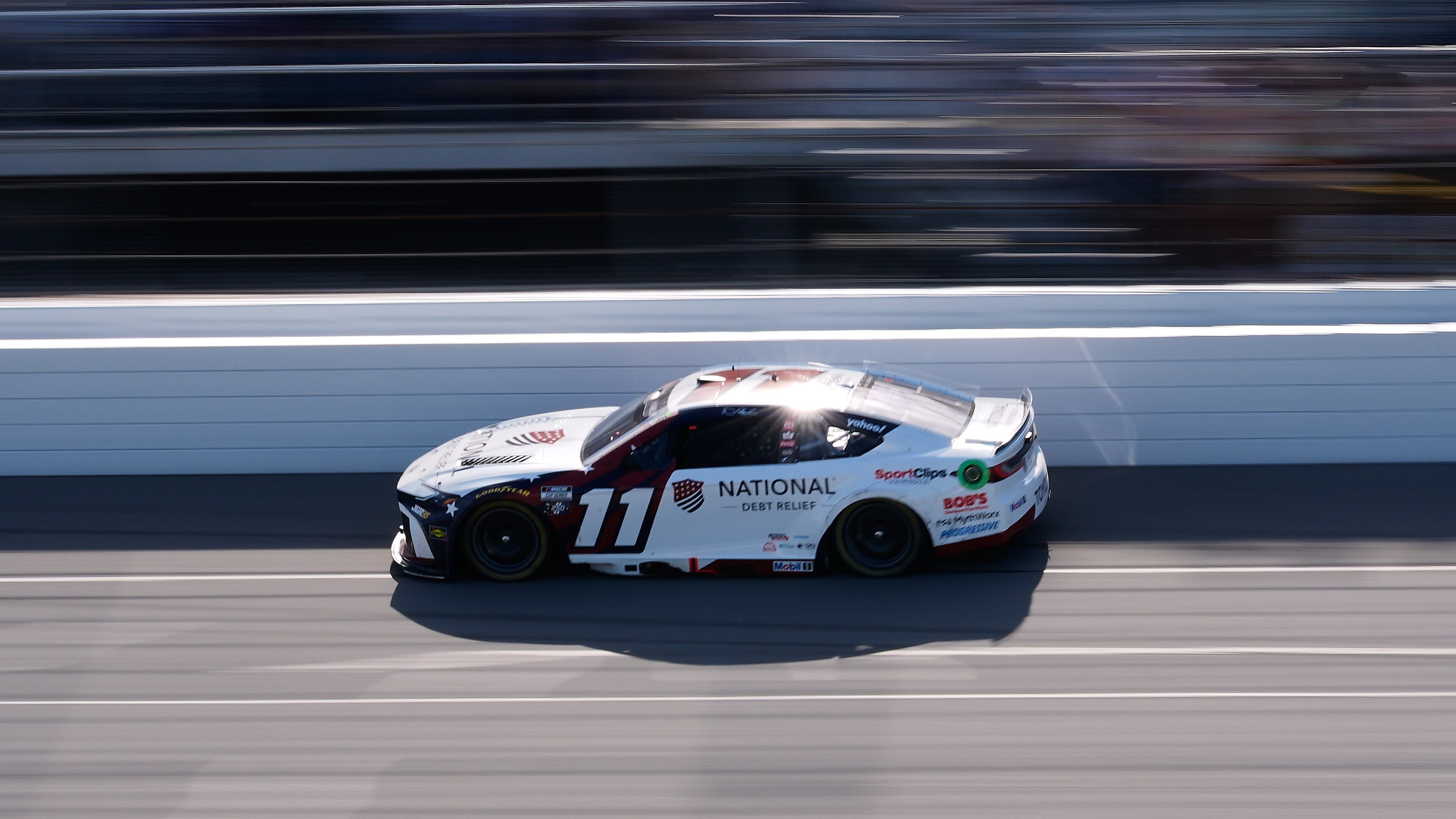 Denny Hamlin (11) drives during a NASCAR Cup Series auto race at Michigan International Speedway in Brooklyn, Mich., Sunday, June 7, 2026. (AP Photo/Paul Sancya)