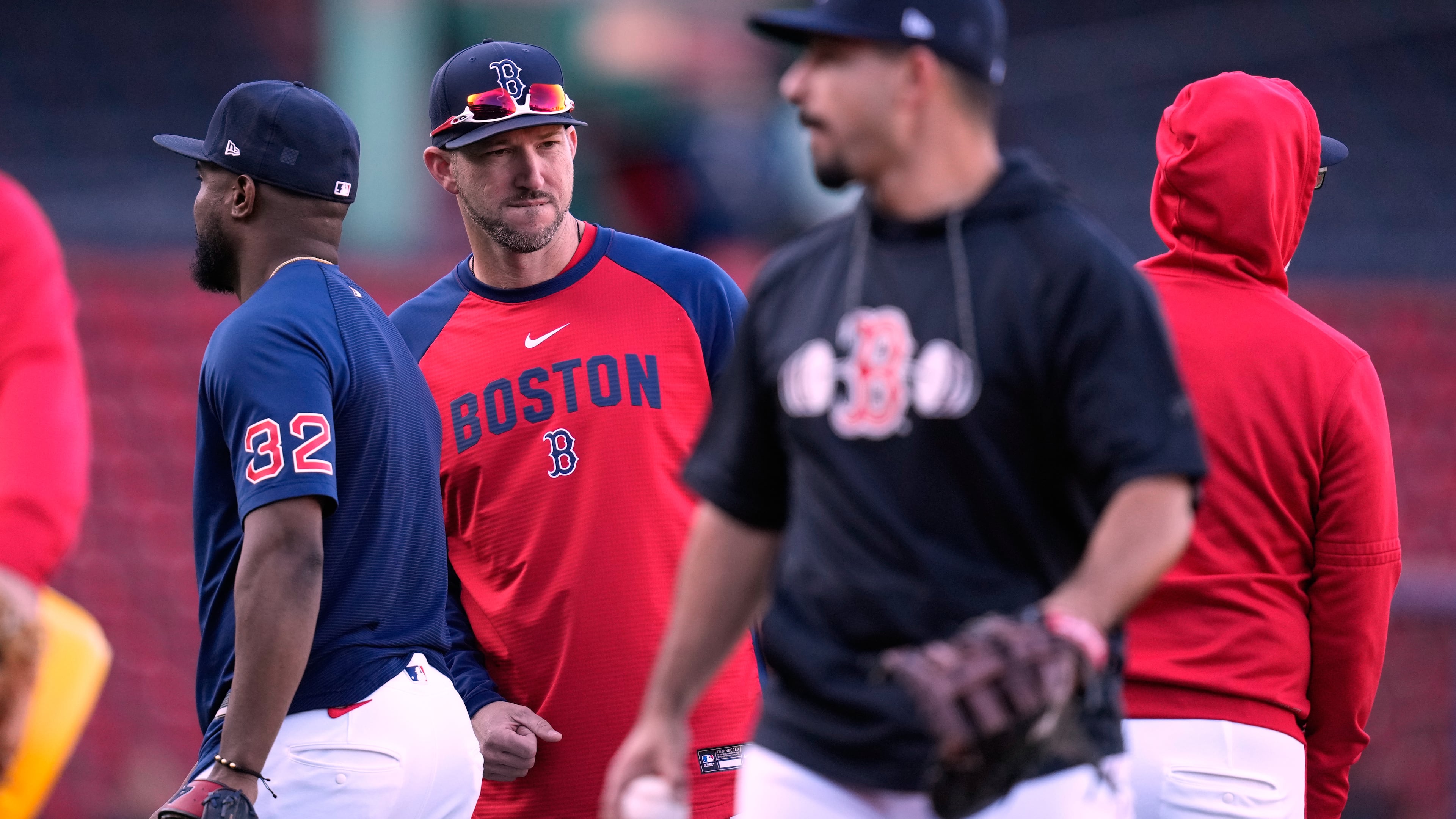 Boston Red Sox manager Chad Tracy talks with his players during batting practice prior to a baseball game against the Cleveland Guardians, Tuesday, Sept. 22, 2026, in Boston. (AP Photo/Charles Krupa)