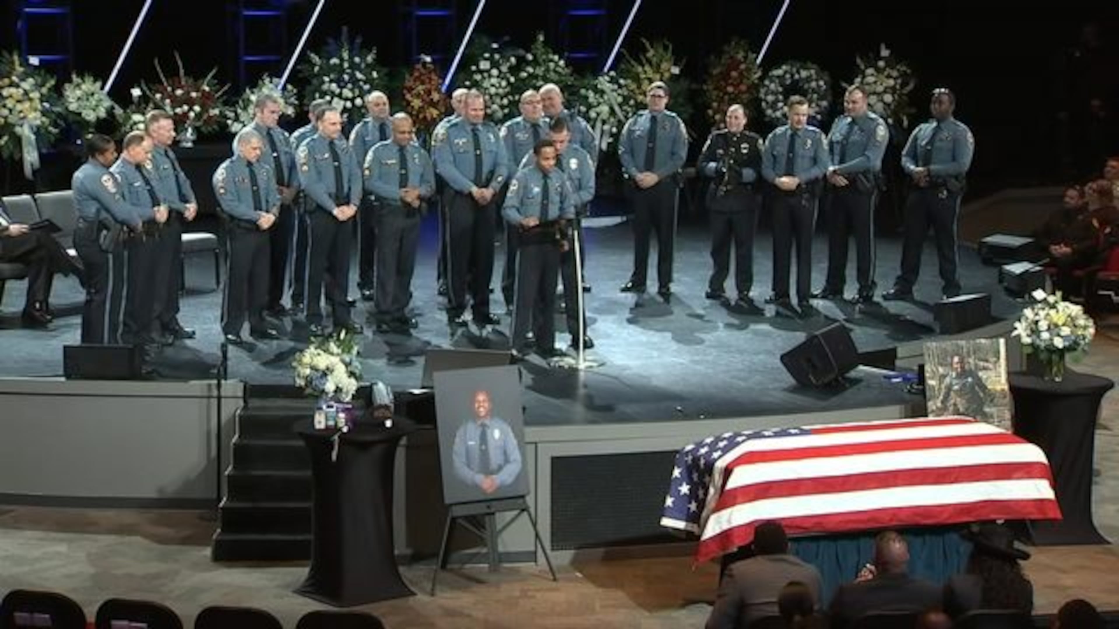 <p>Officer Antwan Toney funeral</p> <p>Officers with Gwinnett County Police Department gather behind the casket of fallen officer Antwan Toney.</p> <p>Antwan Toney</p>