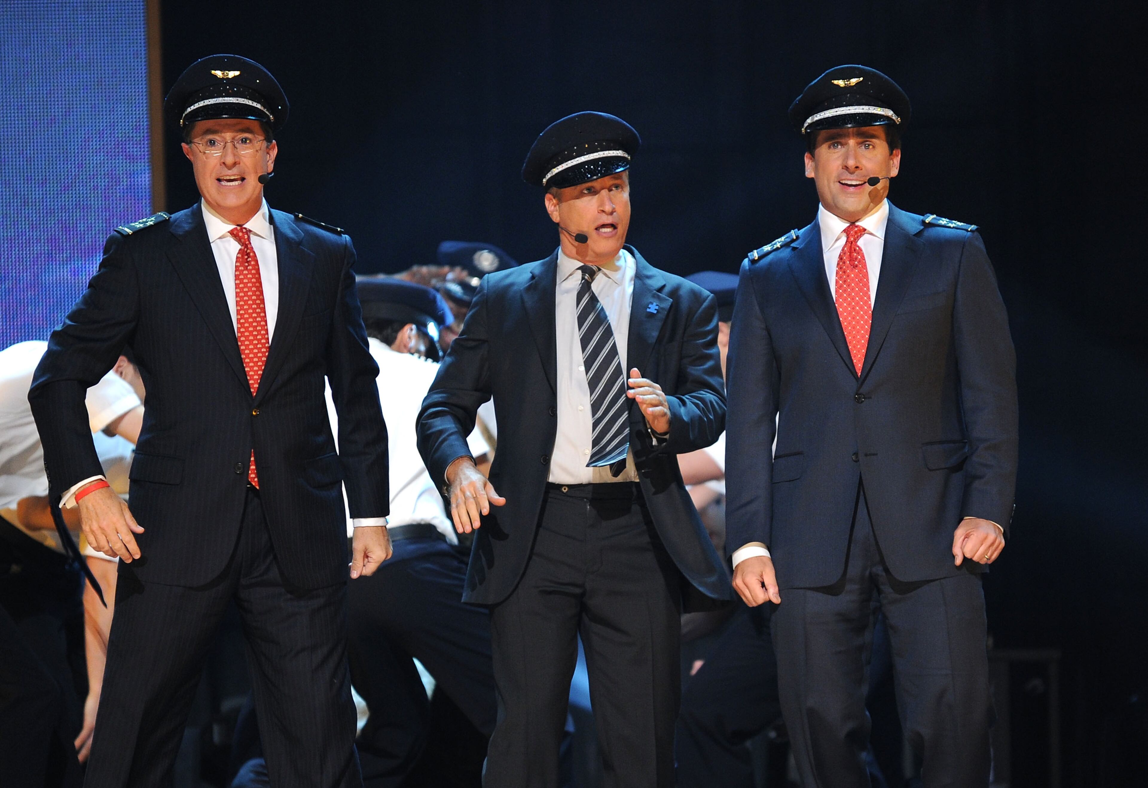 From left, Stephen Colbert, Jon Stewart and Steve Carell perform onstage at Comedy Central's Night Of Too Many Stars: An Overbooked Concert For Autism Education at the Beacon Theatre on October 2, 2010 in New York City. (Photo by Jason Kempin/Getty Images)