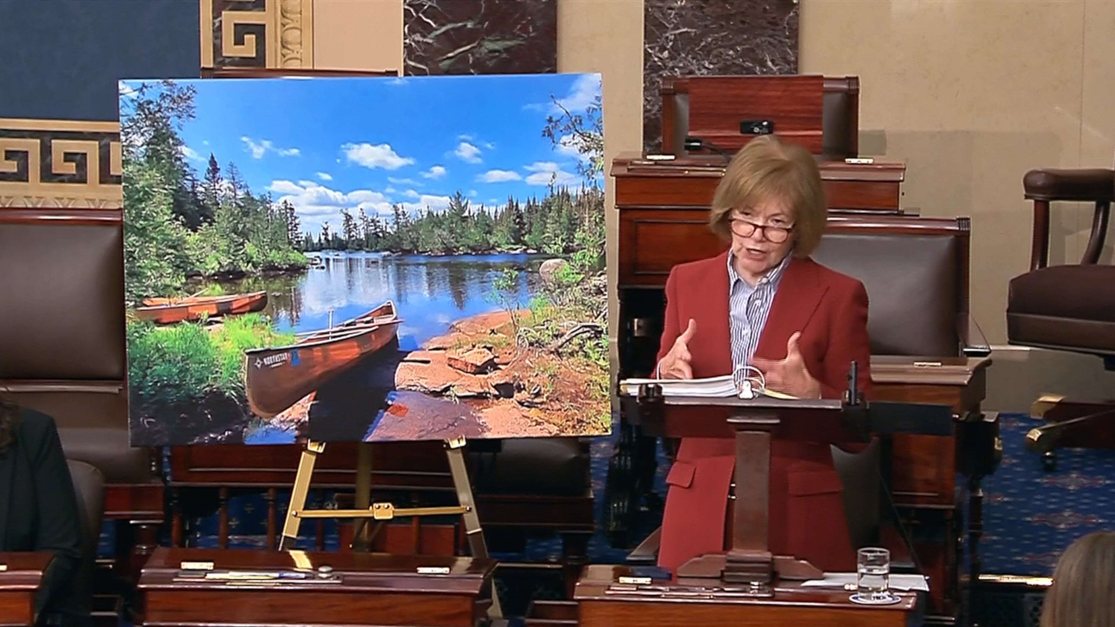 In this image from Senate Television video, Sen. Tina Smith, D-Minn., speaks about the Boundary Waters in northern Minnesota, on the Senate floor at the U.S. Capitol in Washington, Wednesday, April 15, 2026. (Senate Television via AP)