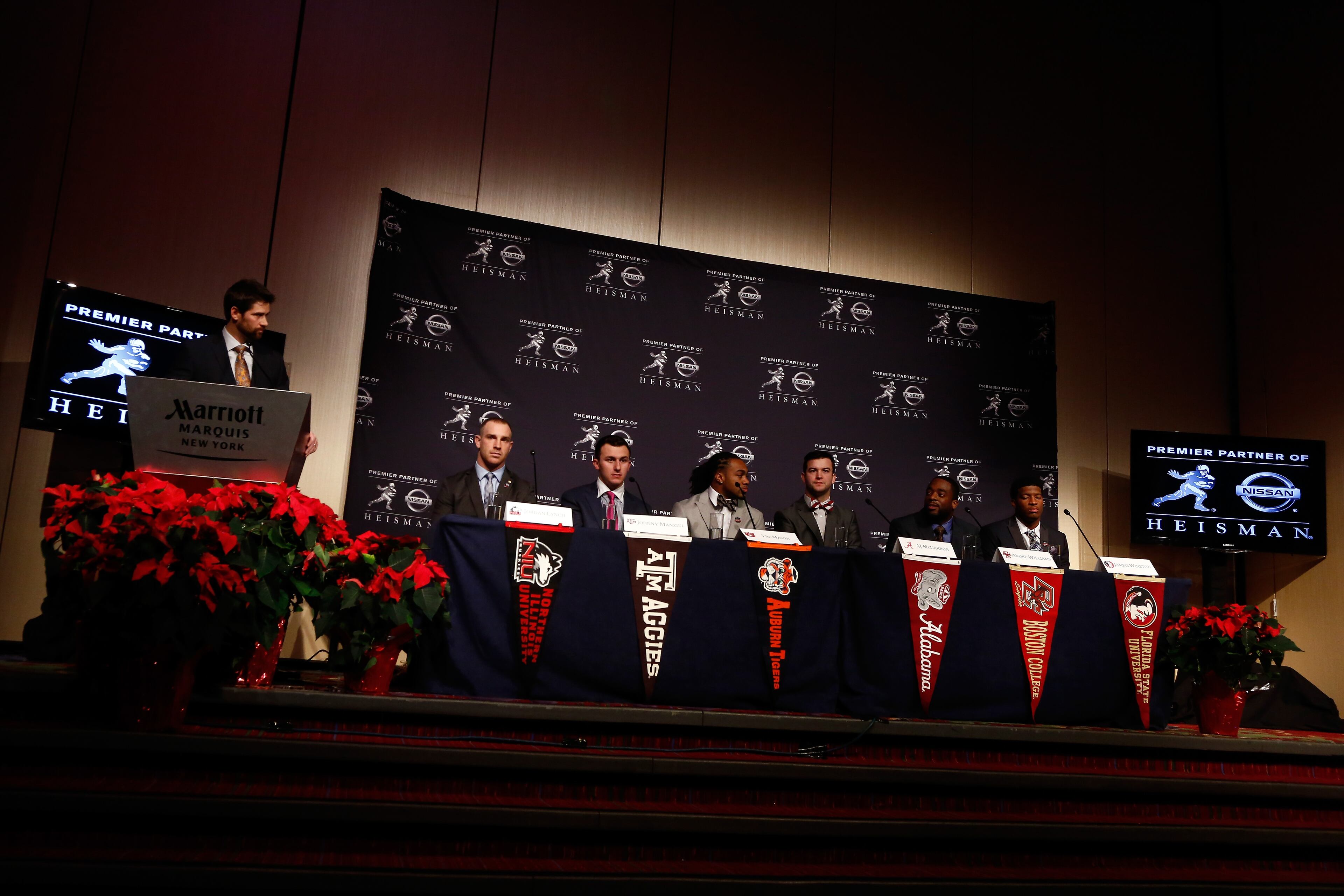 NEW YORK, NY - DECEMBER 14: (L-R) Jordan Lynch, quarterback of the Northern Illinios Huskies, Johnny Manziel, quarterback of the Texas A&M aggies, Tre Mason, running back for the Auburn University Tigers, AJ McCarron of the Alabama Crimson Tide, Andre Williams, quarterback of the Boston College Eagles, and Jameis Winston, quarterback of the Florida State Seminoles, speak to the media during a press conference prior to the 2013 Heisman Trophy Presentation at the Marriott Marquis on December 14, 2013 in New York City. (Photo by Jeff Zelevansky/Getty Images)
