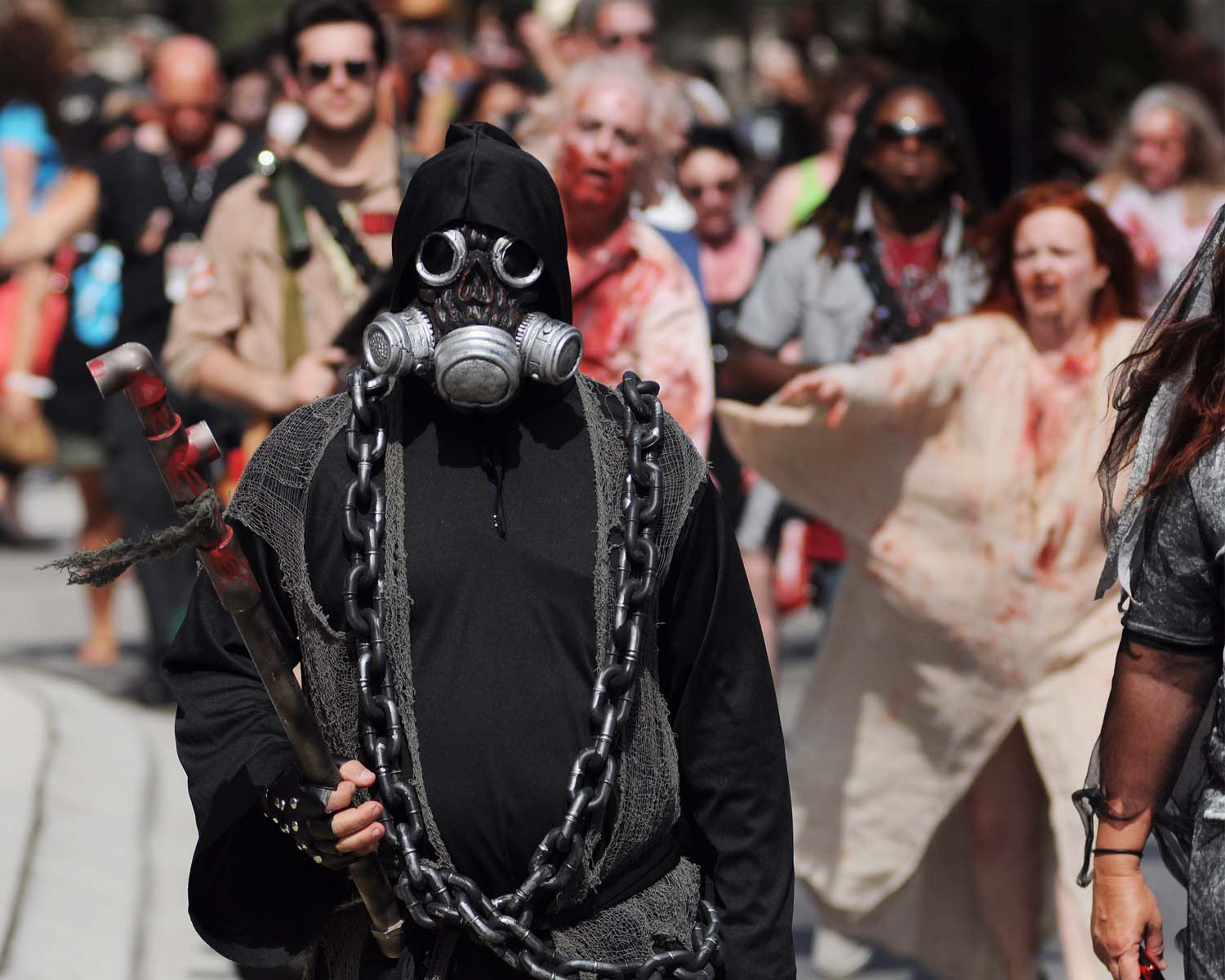 A pack of blood-thirsty zombies marched on the Rosen Centre Hotel in Orlando, Florida to kick off Spooky Empire's annual May-Hem horror convention.