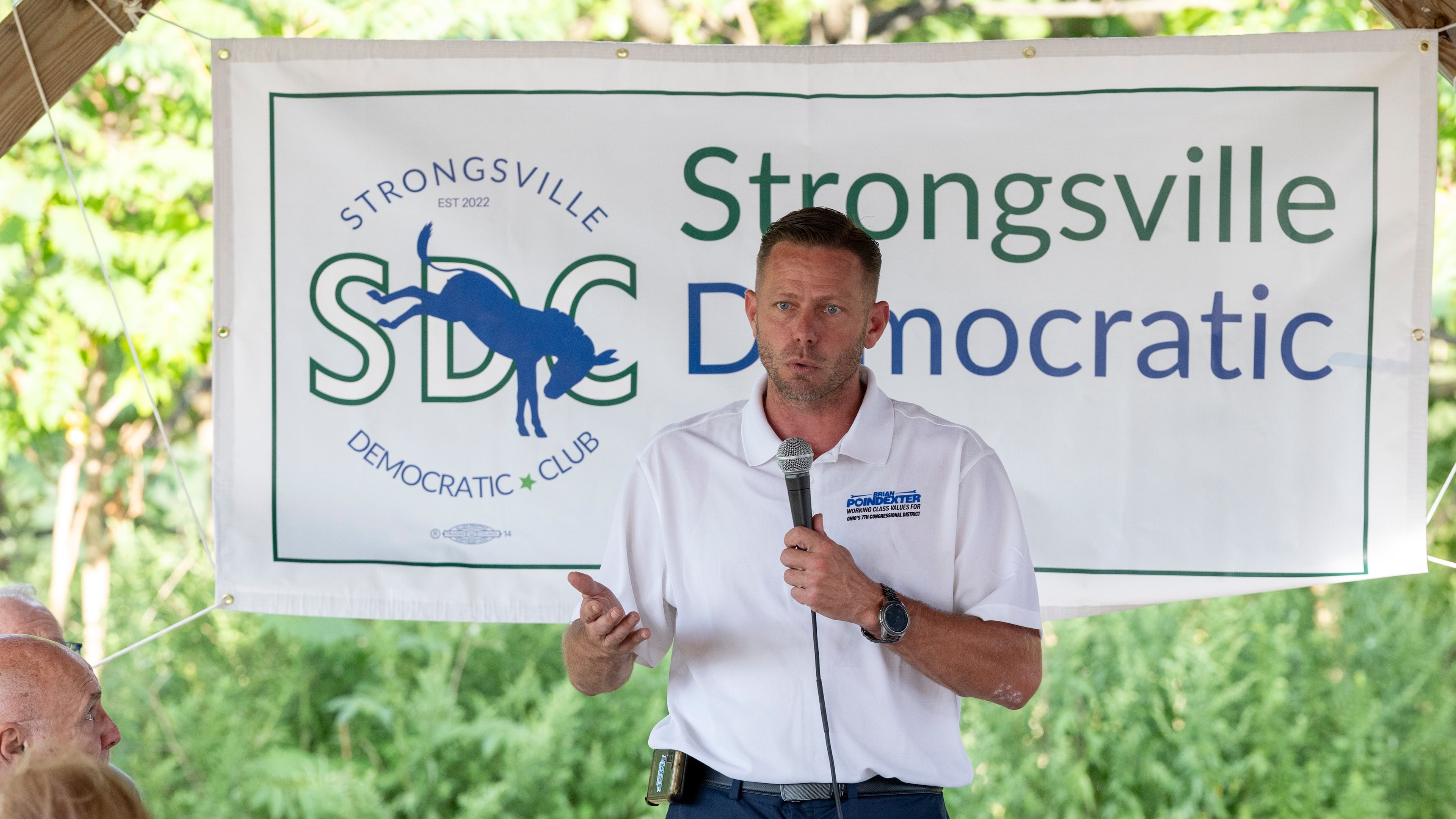 FILE - Brian Poindexter, Democratic nominee for Ohio's 7th congressional district, speaks at the Strongsville Democratic Club meeting, Aug. 5, 2026, in Strongsville, Ohio. (AP Photo/Nate Manley, File)