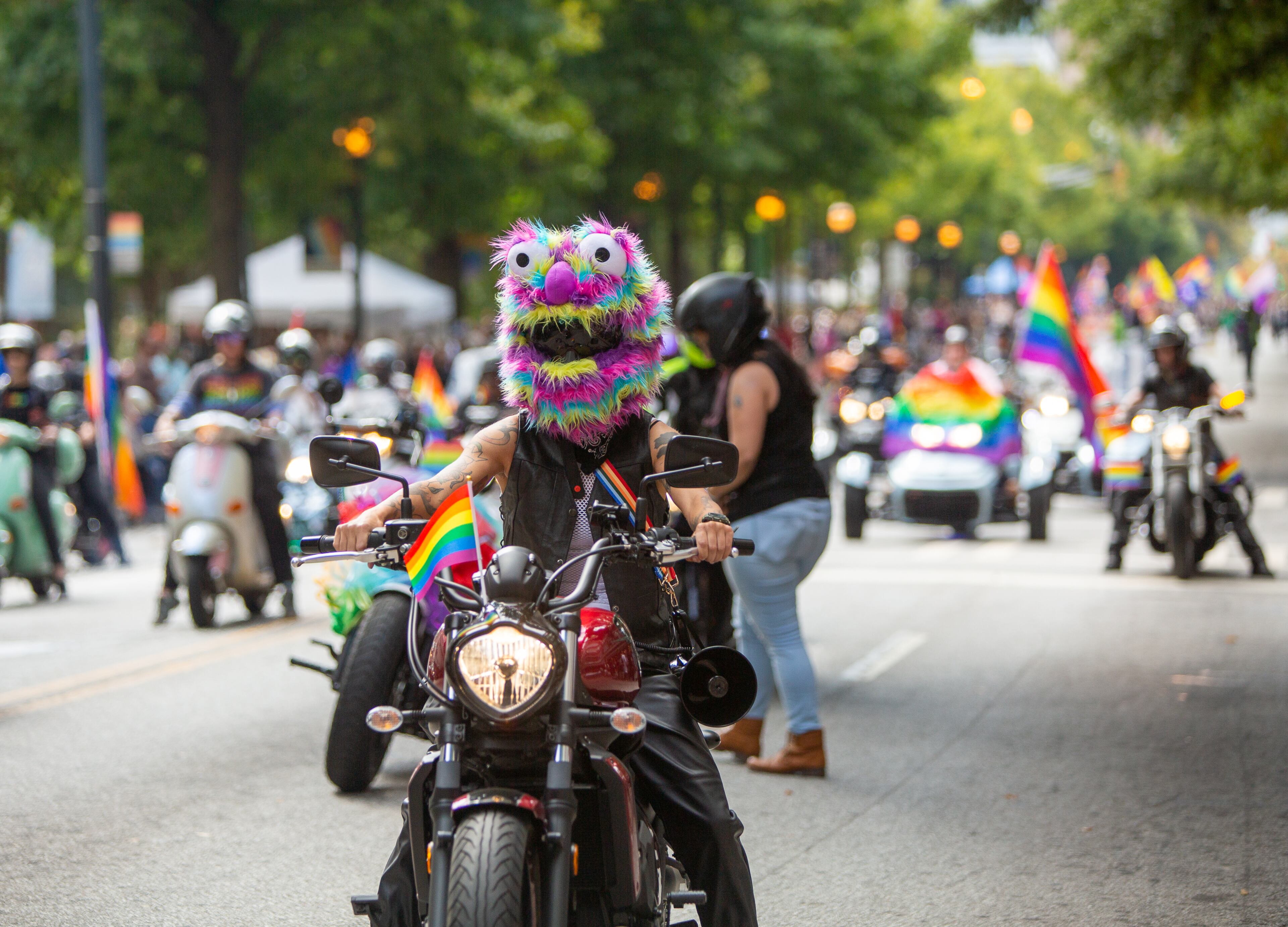 The Atlanta Pride Parade begins its route down Peachtree Street to 10th Street ending in Piedmont Park on Sunday, Oct. 9, 2022. This was the first time the parade had been held since 2019 because of the pandemic. (Photo: Jenni Girtman for The Atlanta Journal-Constitution)