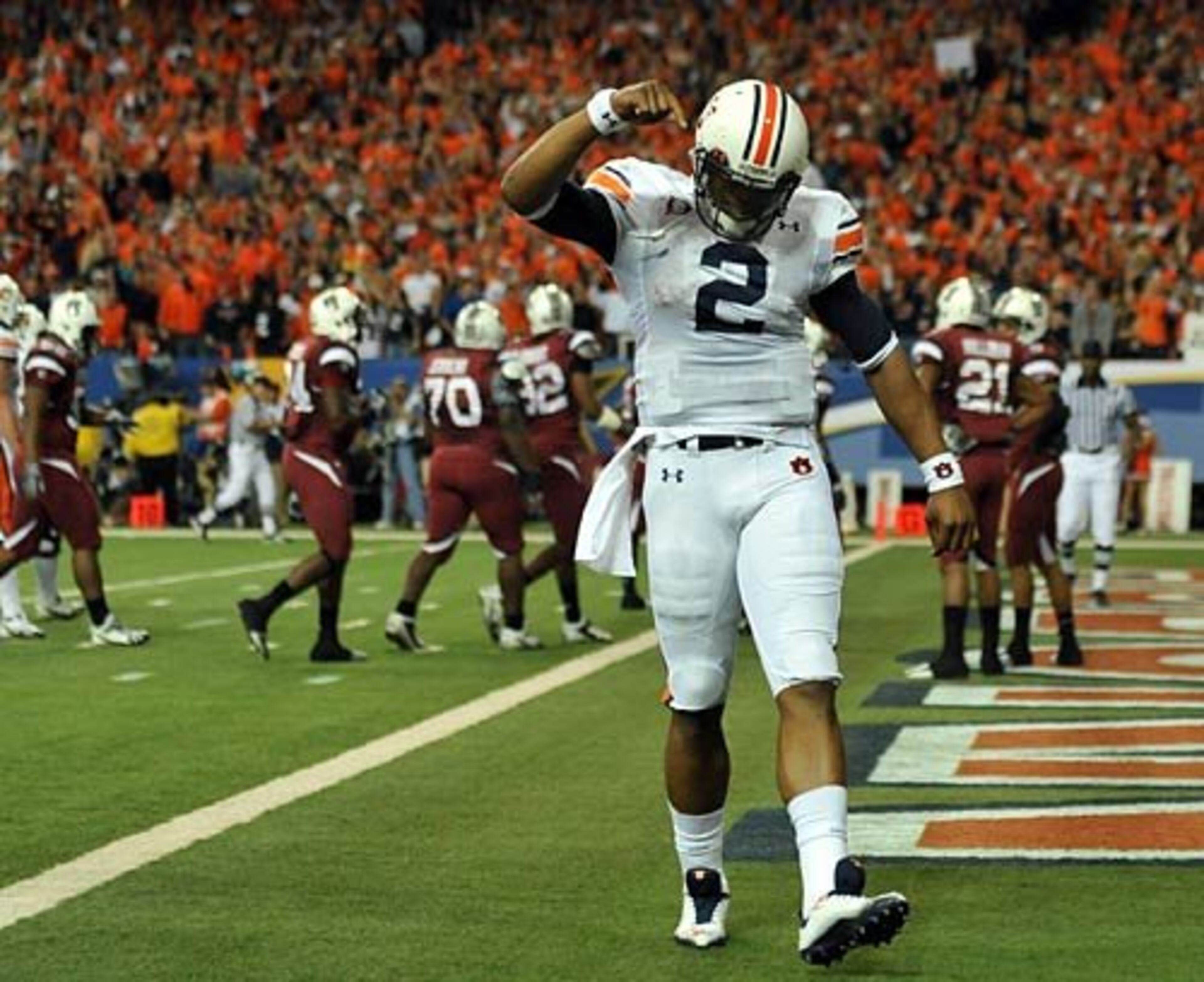 Tigers quarterback Cameron Newton (2) celebrates his 60-yard touchdown pass to wide receiver Darvin Adams during the SEC Championship at the Georgia Dome Saturday December 4, 2010.