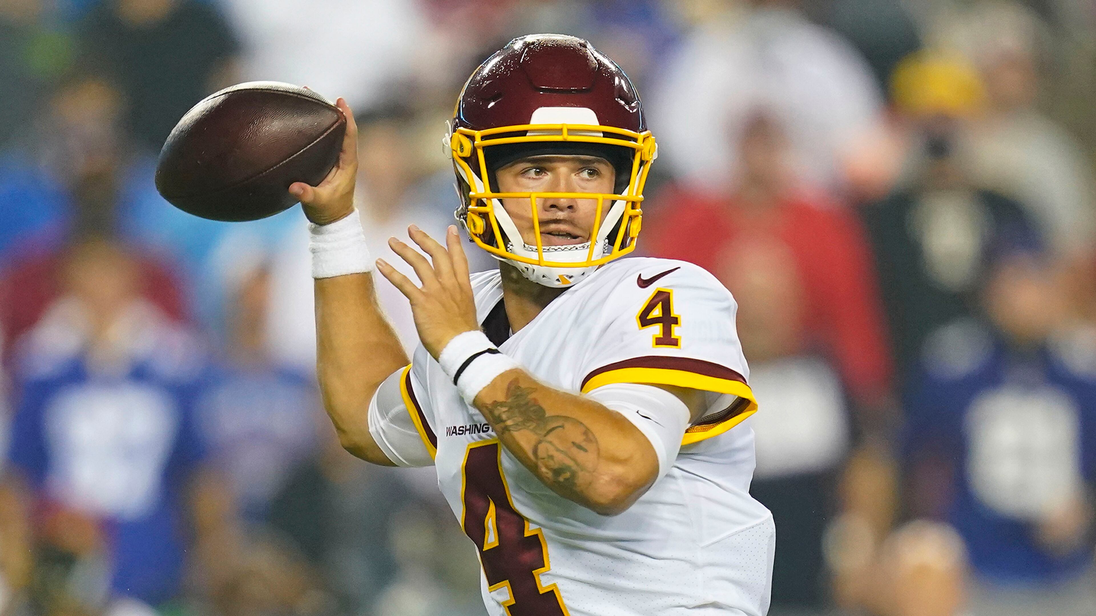 Washington Football Team quarterback Taylor Heinicke (4) attempts a pass against the New York Giants Thursday, Sept. 16, 2021, in Landover, Md. (Patrick Semansky/AP)