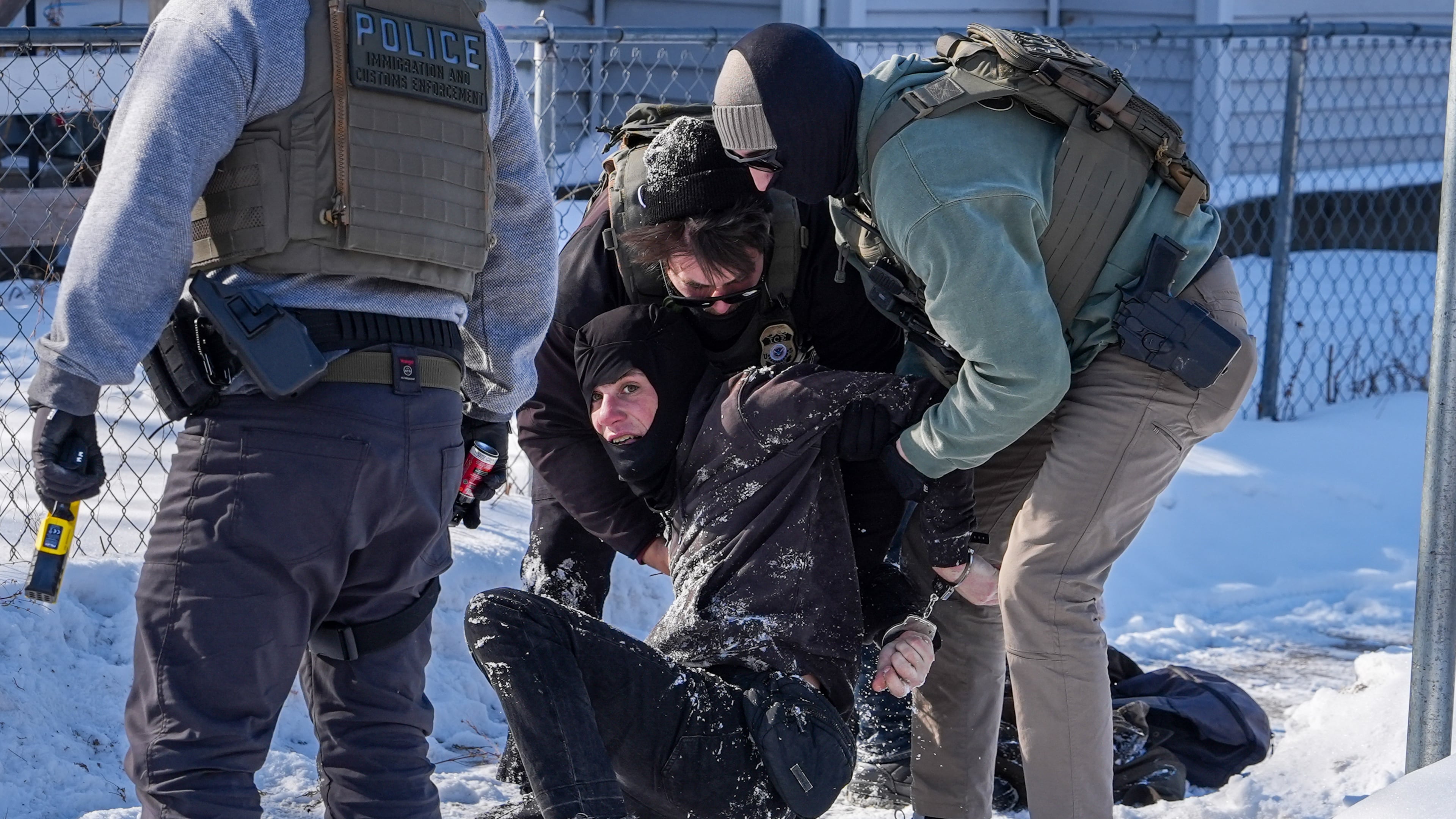 An person is detained by federal agents on Tuesday, Feb. 3, 2026, in Minneapolis. (AP Photo/Ryan Murphy)