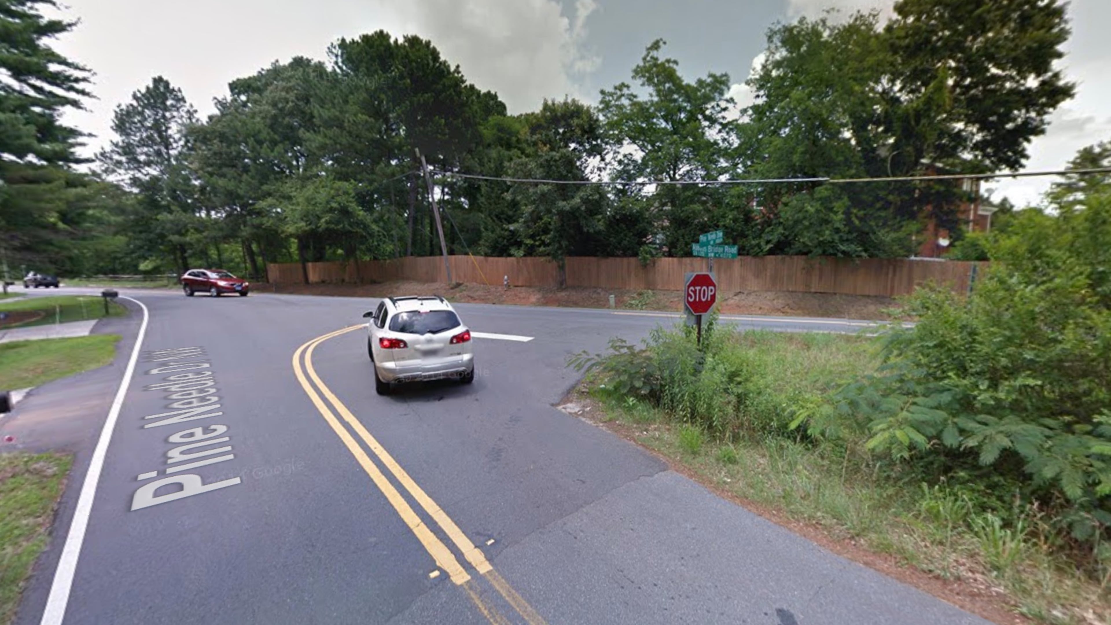 Duluth and Gwinnett will spend SPLOST funds to straigthen angle at Pine Needle Drive and State Route 120/Abbotts Bridge Road. Google Maps