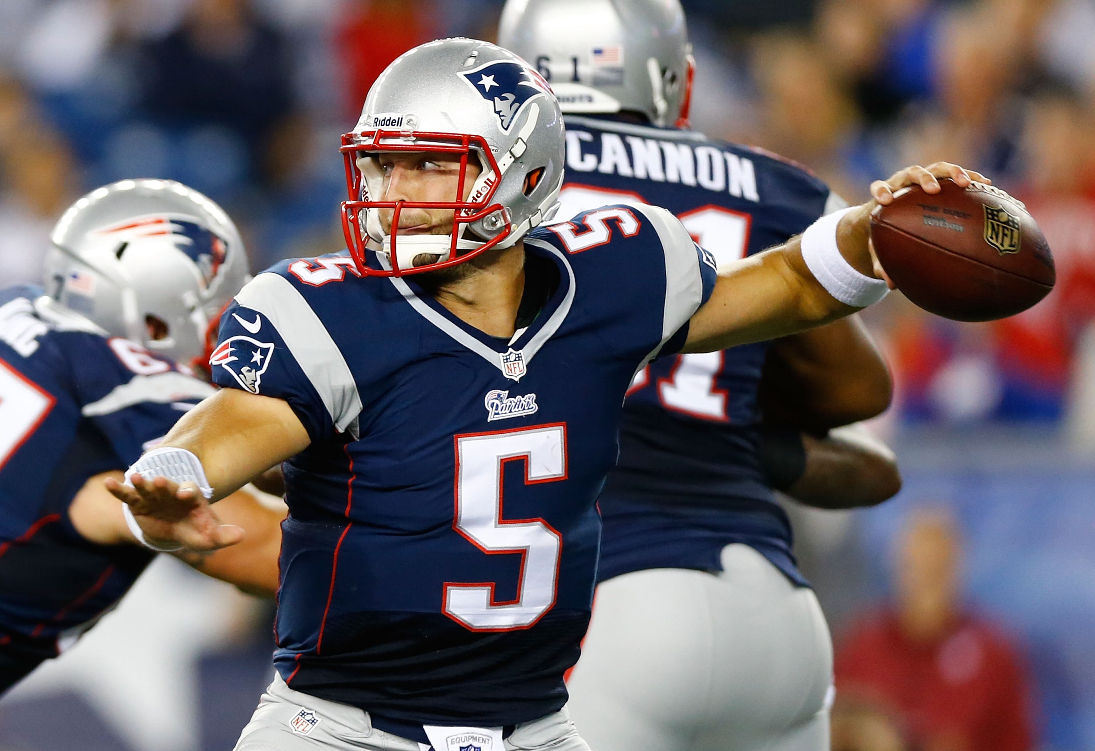 FOXBORO, MA - AUGUST 29: Tim Tebow #5 of the New England Patriots throws a pass against the New York Giants in the second half during the preseason game at Gillette Stadium on August 29, 2013 in Foxboro, Massachusetts. (Photo by Jared Wickerham/Getty Images)