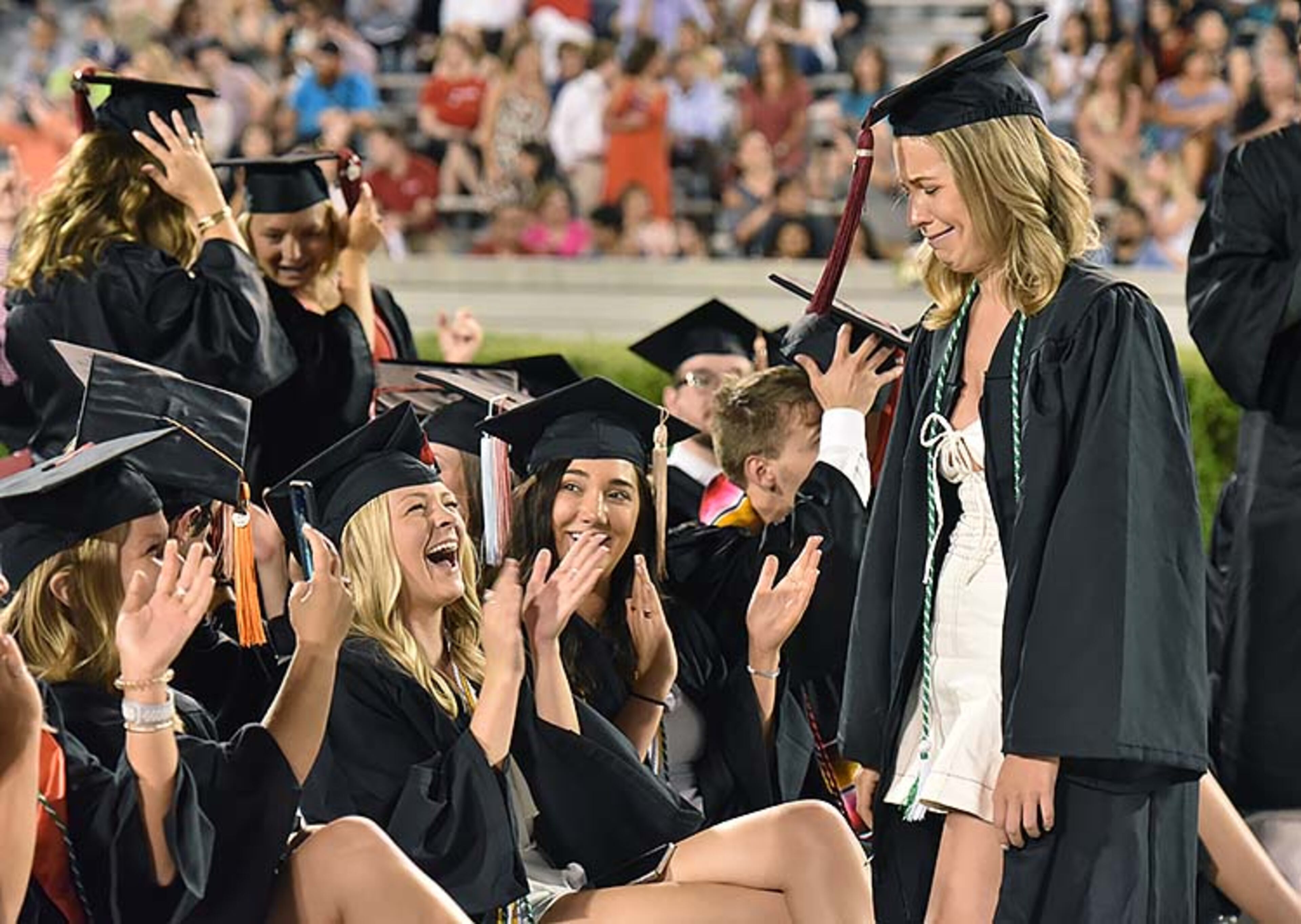 May 10, 2019 Athens - Hannah Robertson cries after she moved her tassel during UGA's 2019 spring undergraduate commencement ceremony at Sanford Stadium in Athens on Friday, May 10, 2019. HYOSUB SHIN / HSHIN@AJC.COM