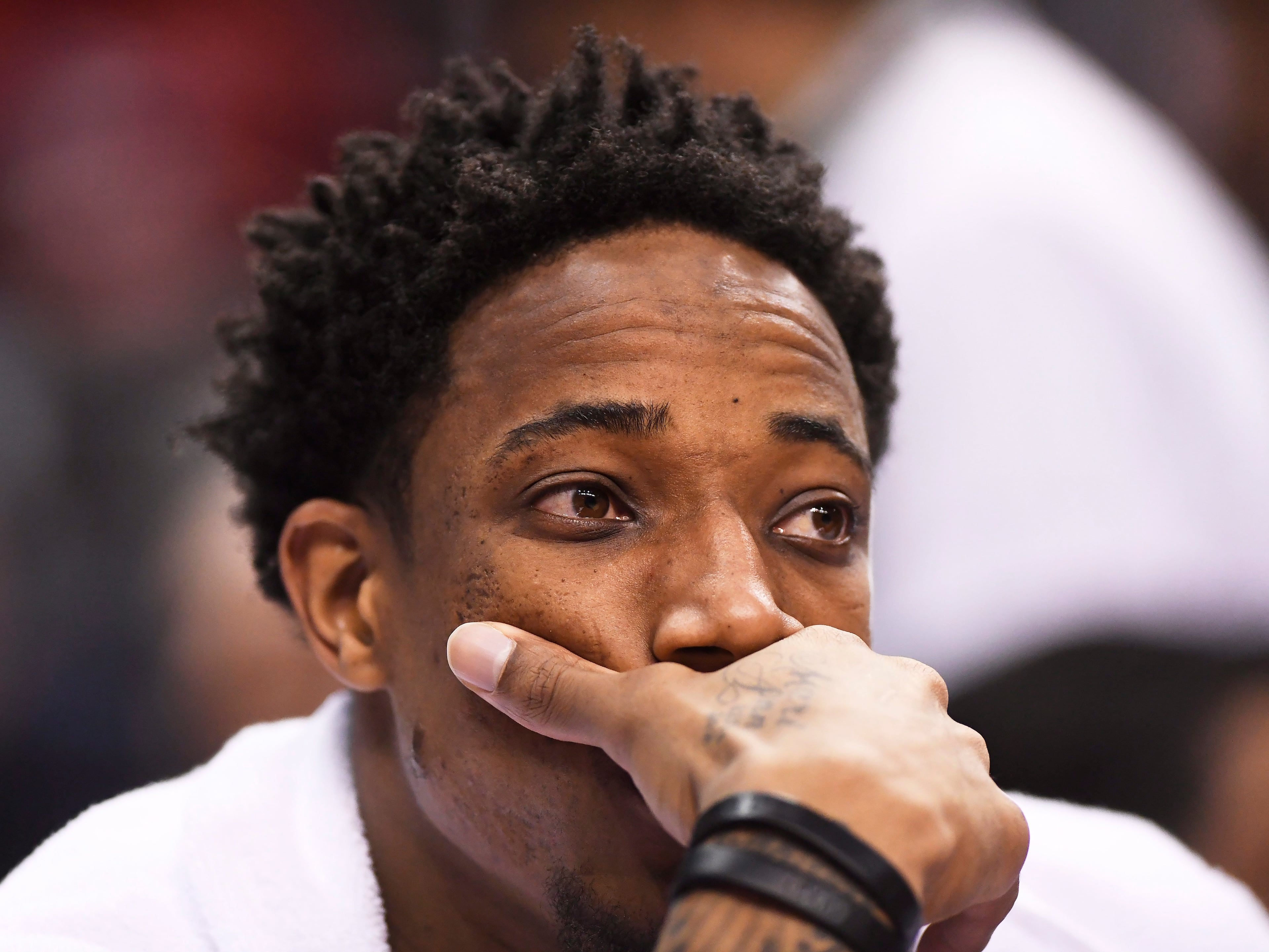 Toronto's DeMar DeRozan sits on the bench during the second half of Game 3 of the Raptors-Cavaliers series.