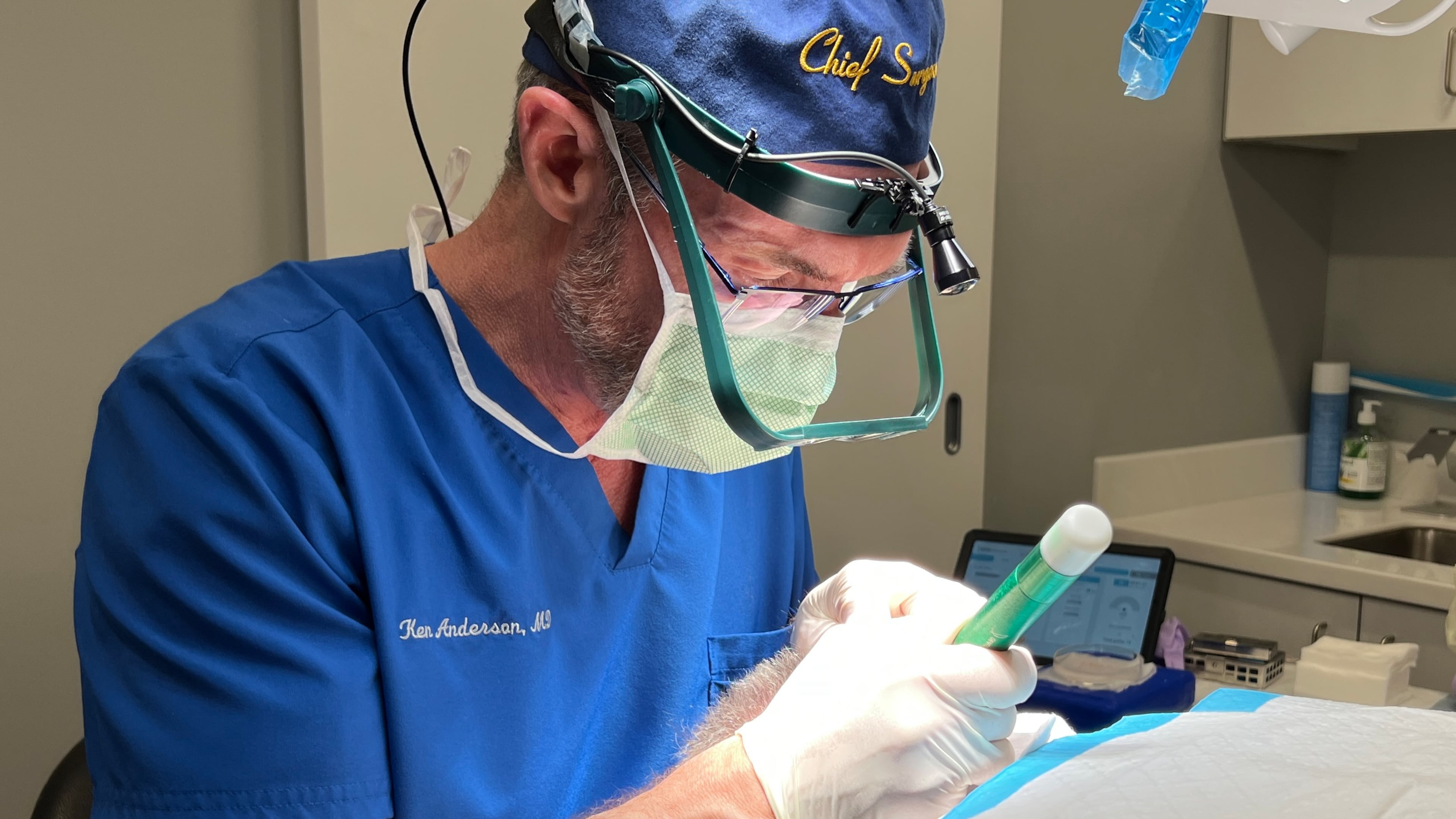 Dr. Ken Anderson, founder of the Anderson Center for Hair, treats an Atlanta-area patient for hair loss. “It can be absolutely transformational,” Anderson says. (Courtesy of Meghan Channon)