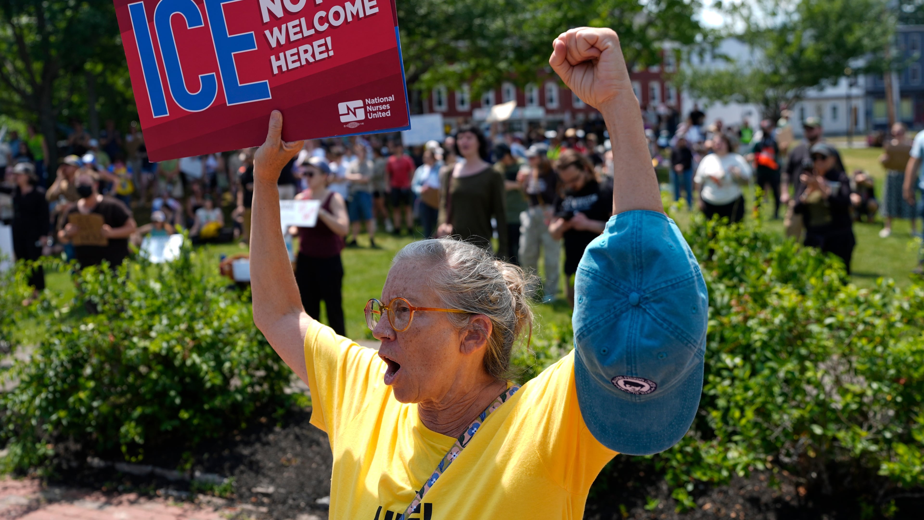 Protesters gather at a park near the scene of a shooting involving U.S. Immigration and Customs Enforcement, Monday, July 13, 2026 in Biddeford, Maine. (AP Photo/Robert F. Bukaty)