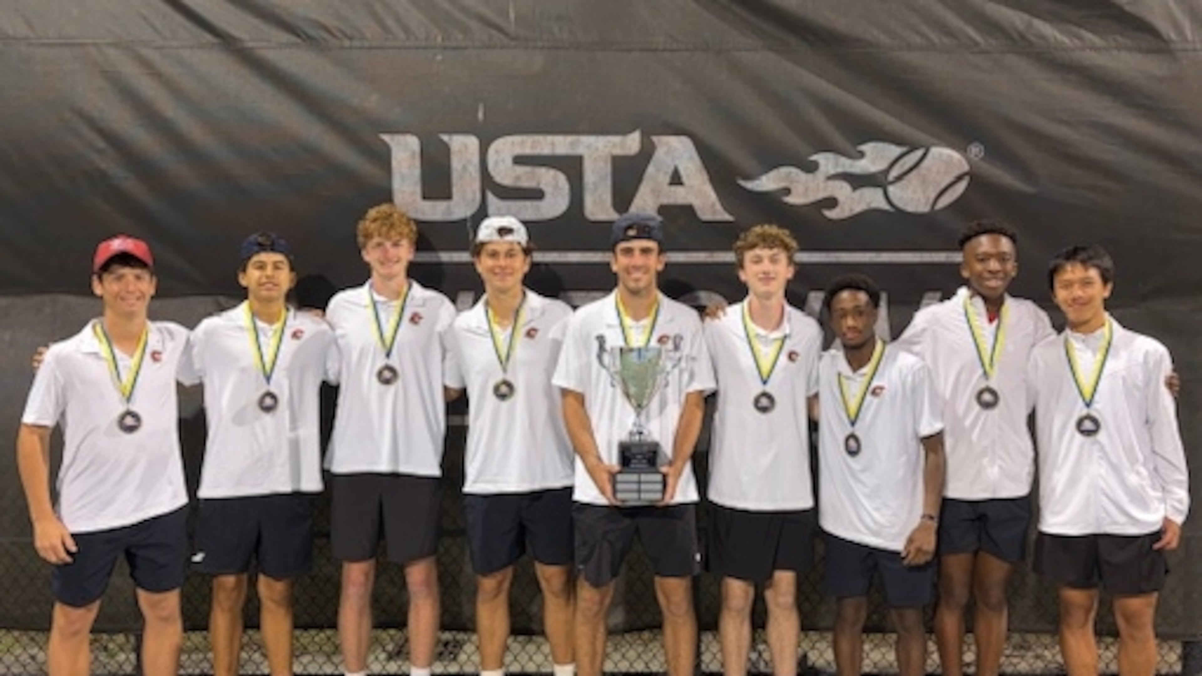 Greater Atlanta Christian won the National High School Tennis Championship at the USTA National Campus in Orlando, Florida, in February. Pictured, from left, are Brady Gessner, Santi Bisogno, Jack Morrison, Marcello Bisogno, Harrison Kemp, Alexander Paden, Freddy Dougah, Jason Eigbedion and Simon Dong. Ben Hawkins is not pictured. The event was an invitational of the eight highest-rated teams nationwide based on Universal Tennis Rating. (Courtesy of Greater Atlanta Christian)