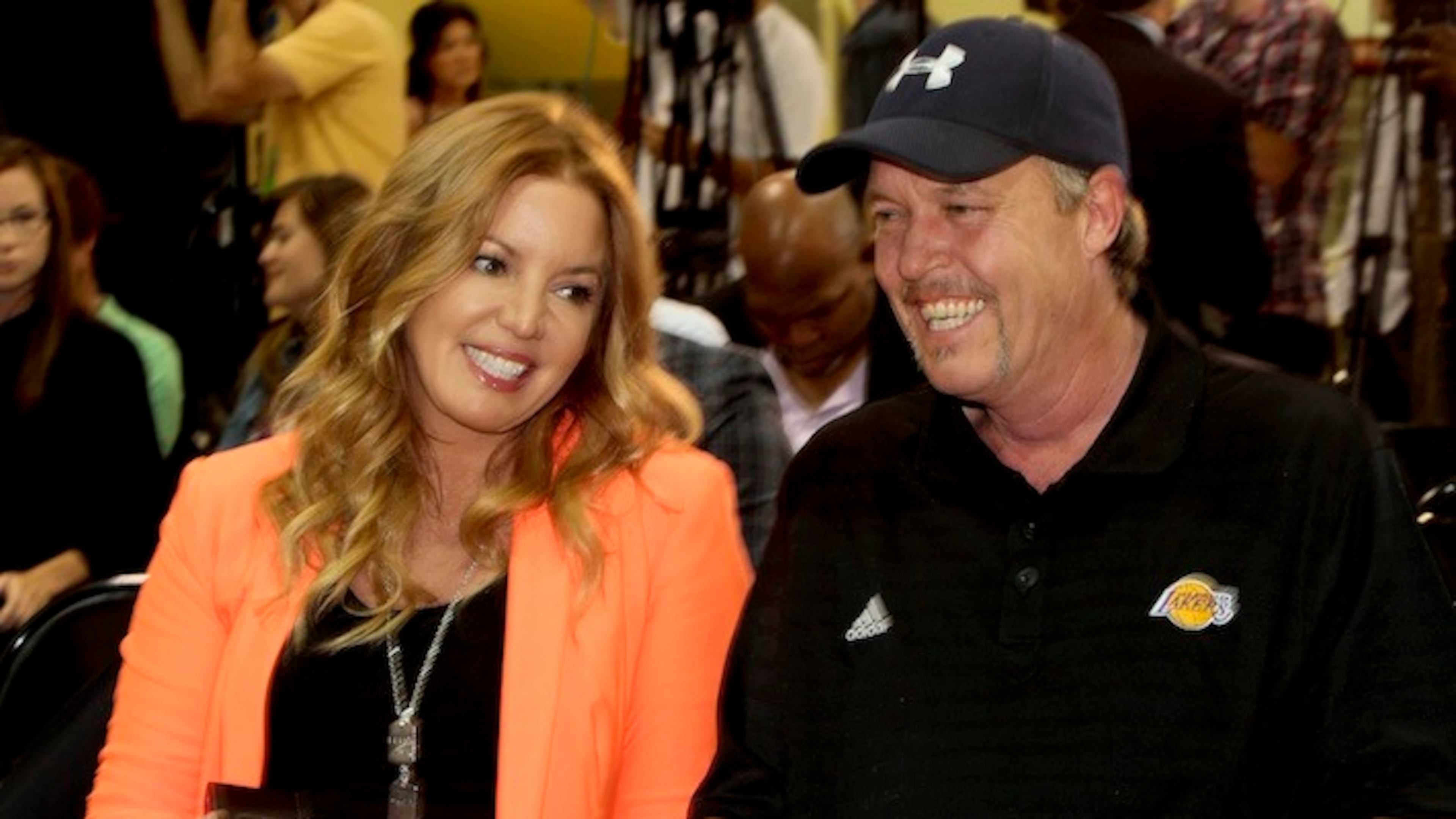 Jeanie and Jim Buss talk before the start of a news conference at the Toyota Sports Center in El Segundo, Calif., on August 10, 2012. (Anne Cusack/Los Angeles Times/TNS)