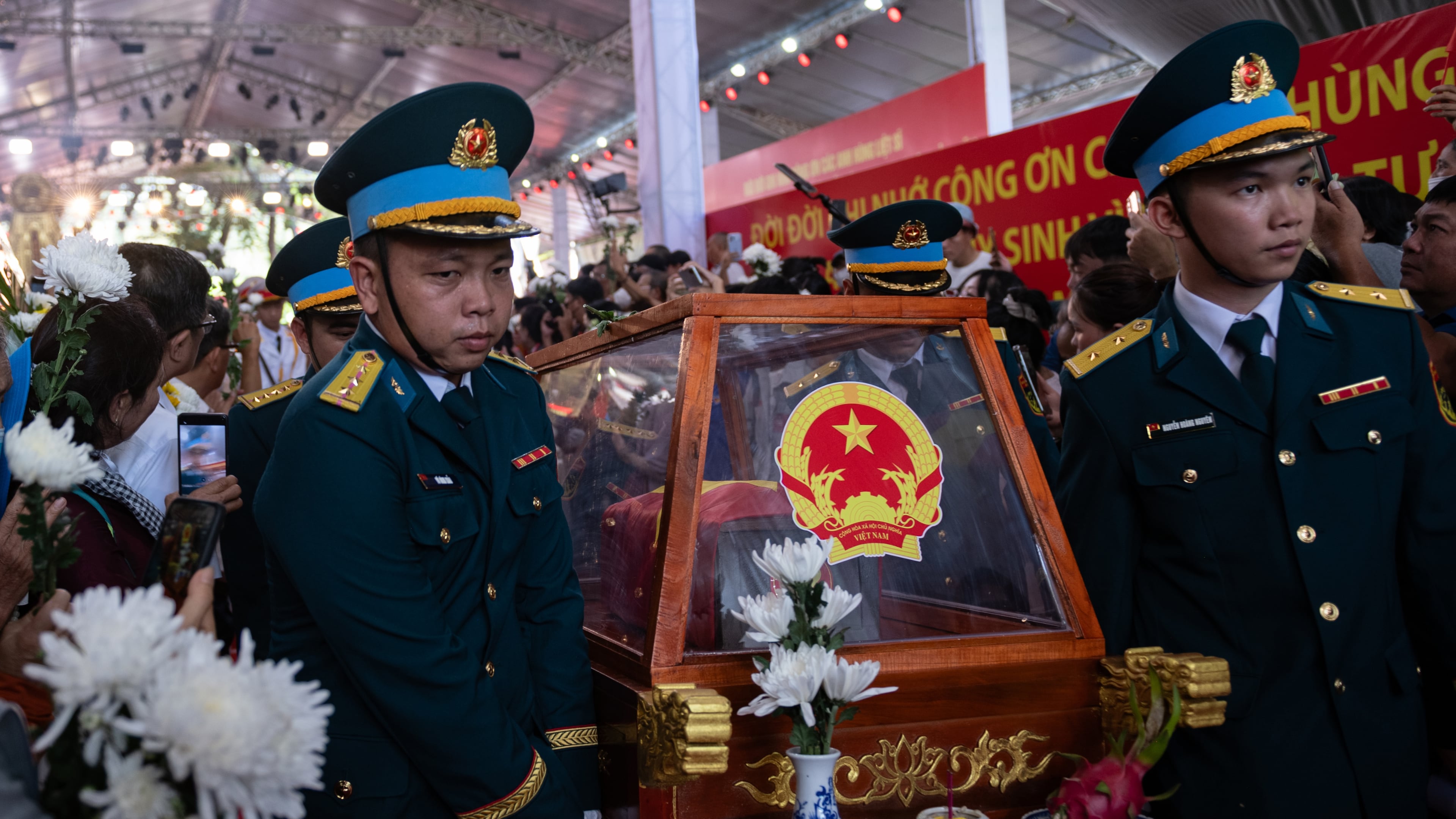 Military personnel carry the remains of 731 martyrs' remains found at Le Thi Rieng Cultural Park for burial at Ho Chi Minh City Martyrs' Cemetery Wednesday, Oct. 14, 2026, in Ho Chi Minh City, Vietnam. (AP Photo/Thanh Hue)