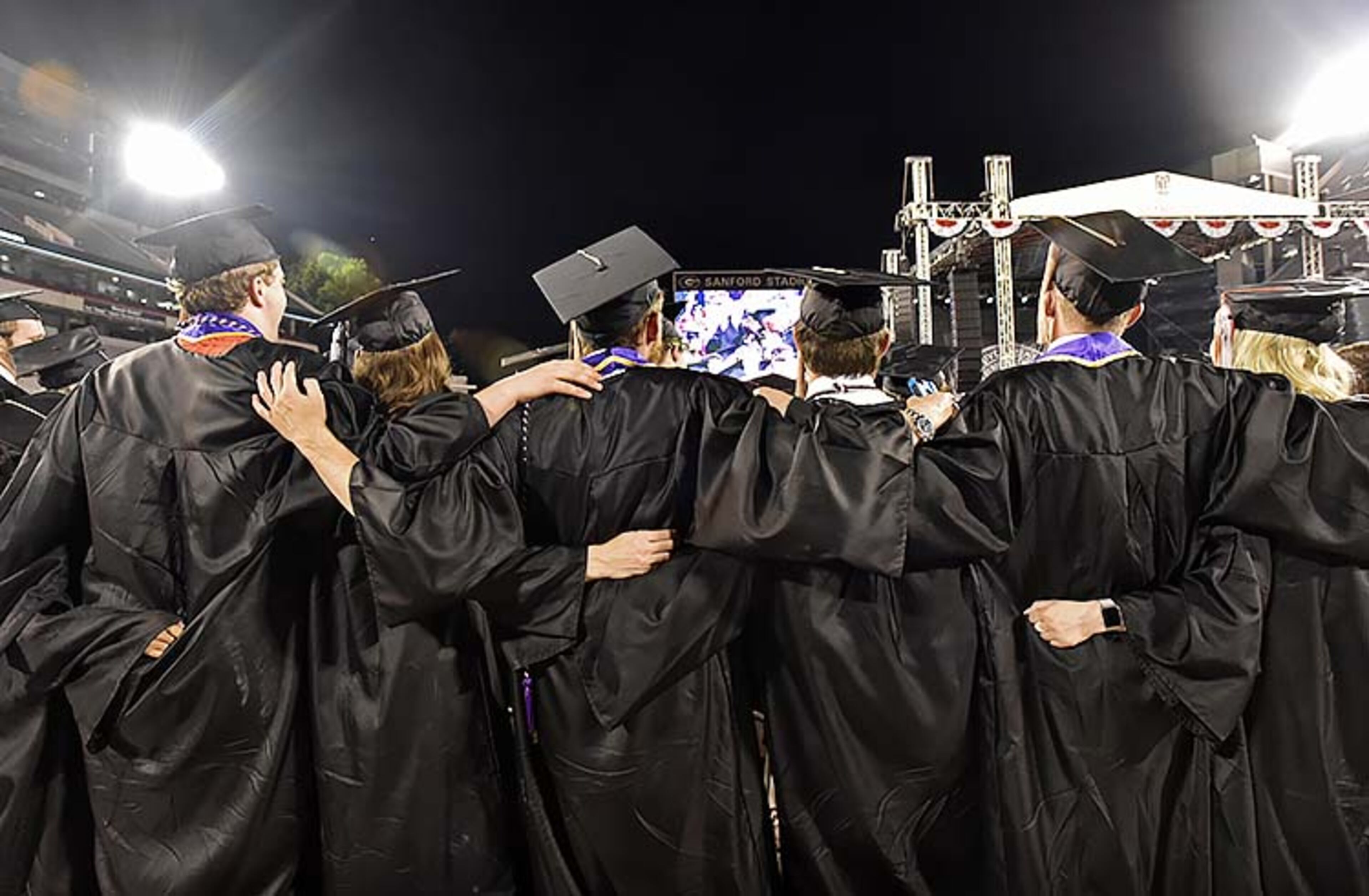 May 10, 2019 Athens - Students sing Alma Mater during UGA's 2019 spring undergraduate commencement ceremony at Sanford Stadium in Athens on Friday, May 10, 2019. HYOSUB SHIN / HSHIN@AJC.COM