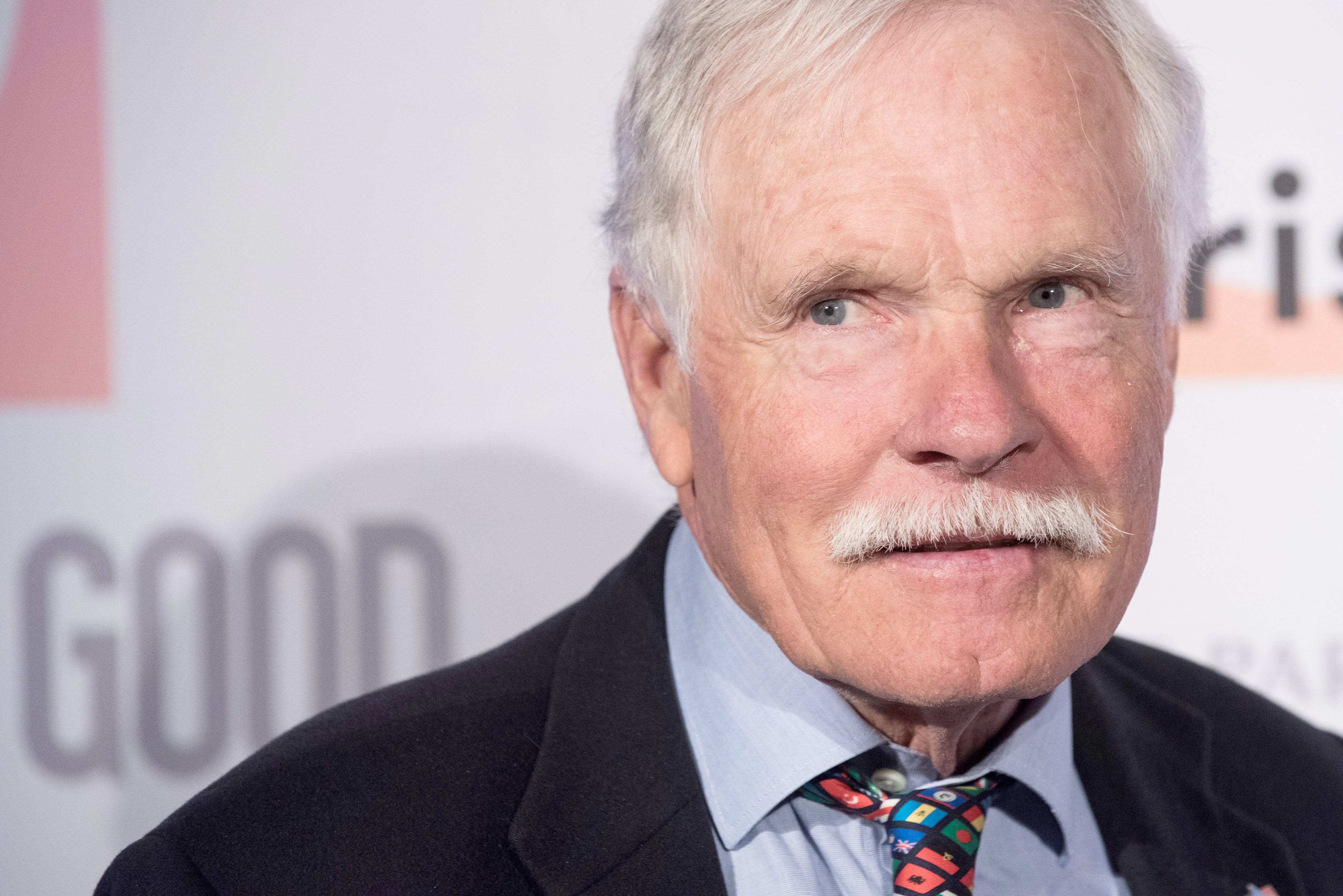 U.S. media mogul Ted Turner poses for the photographers as he arrives prior to a dinner at the U.S. ambassador's residence in Paris, Dec. 8, 2015. (Kamil Zihnioglu/AP File)