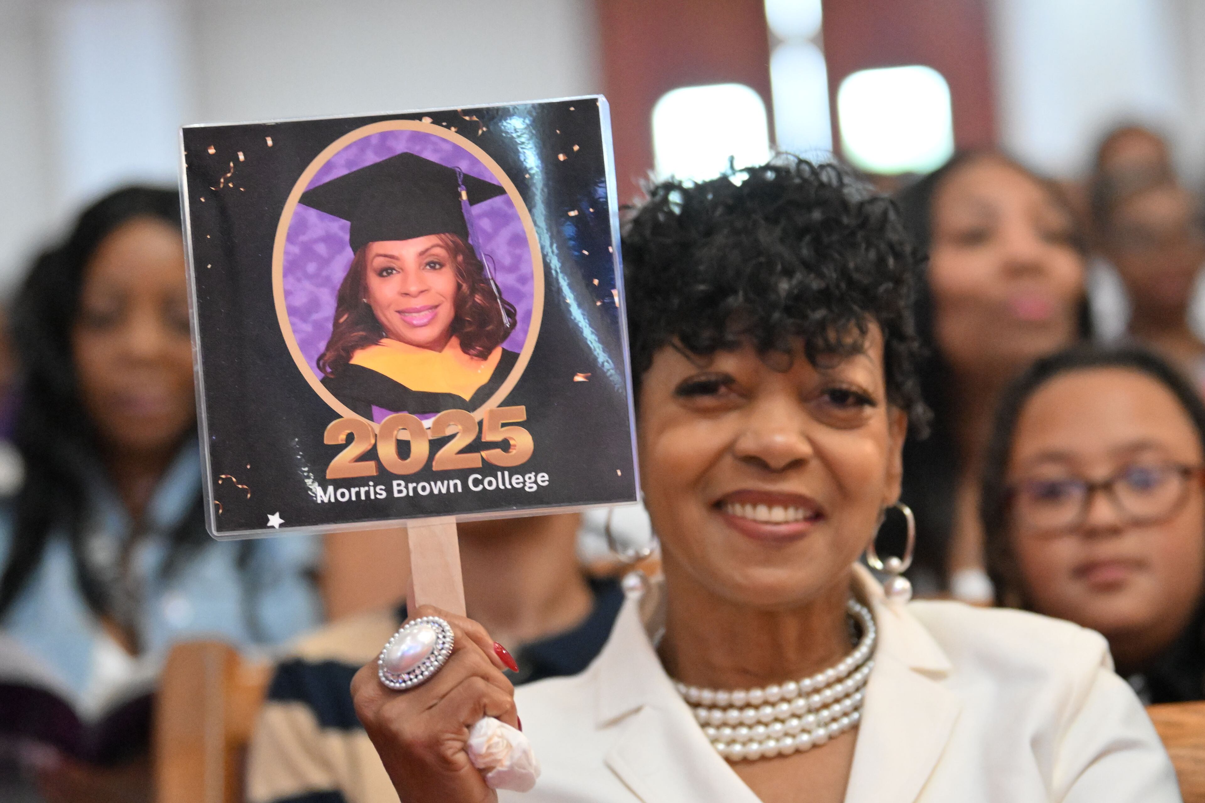 Friends and family members of graduates attend the 2025 Morris Brown College commencement exercises at Saint Philip A.M.E. Church, Saturday, May 17, 2025, in Atlanta. (Hyosub Shin / AJC)