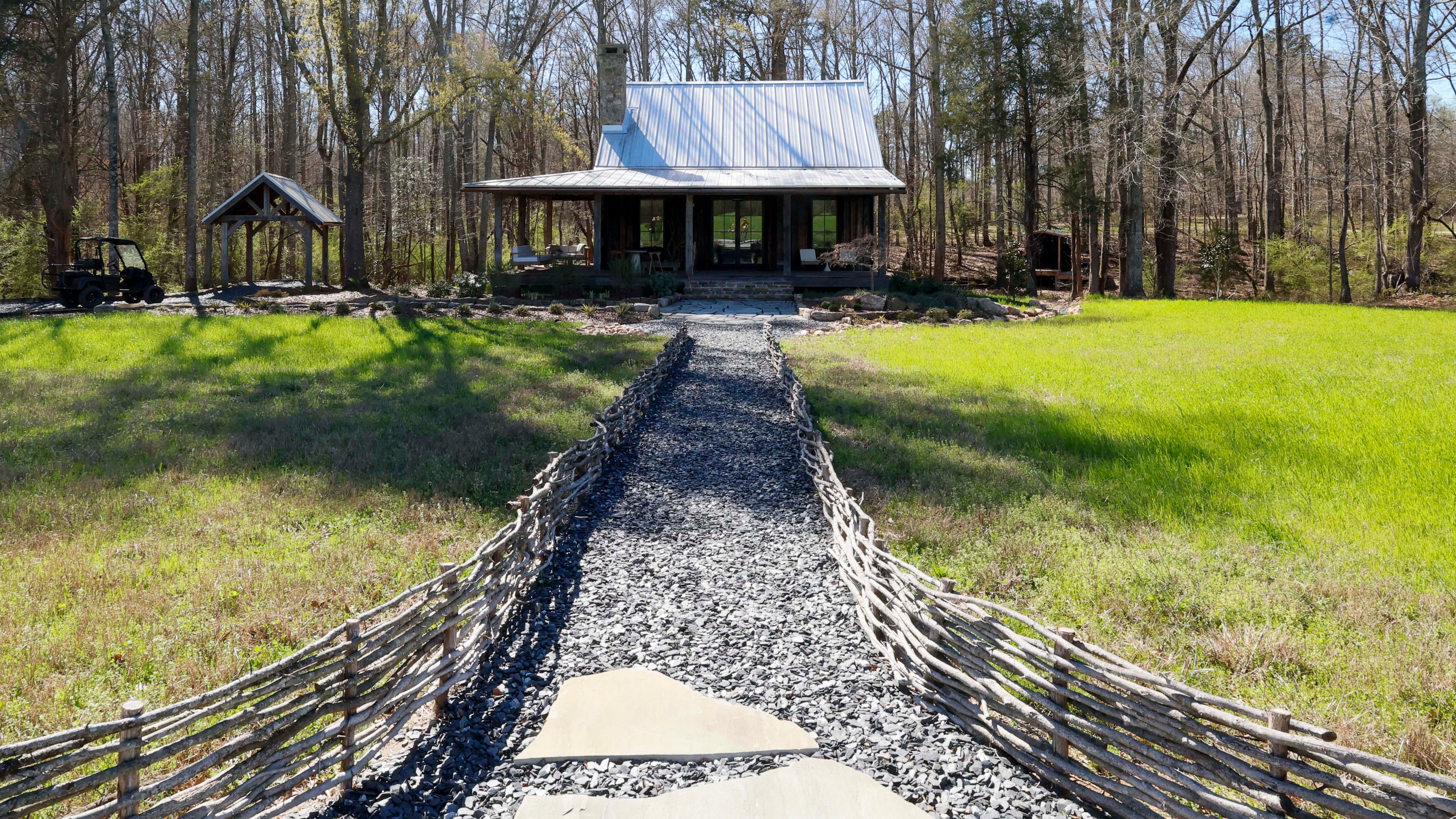 The Ember cabin is one of four cottage-style suites at Quercus, a Luxury Ranch in Meriwether County, seen on Thursday, March 12, 2026. Quercus in Gay, Georgia, was awarded the Best New Hotel Design 2026 by Tablet Hotels, praised for its distinctive blend of regenerative farming and 3,800 acres of forest and pasture. (Miguel Martinez/AJC)