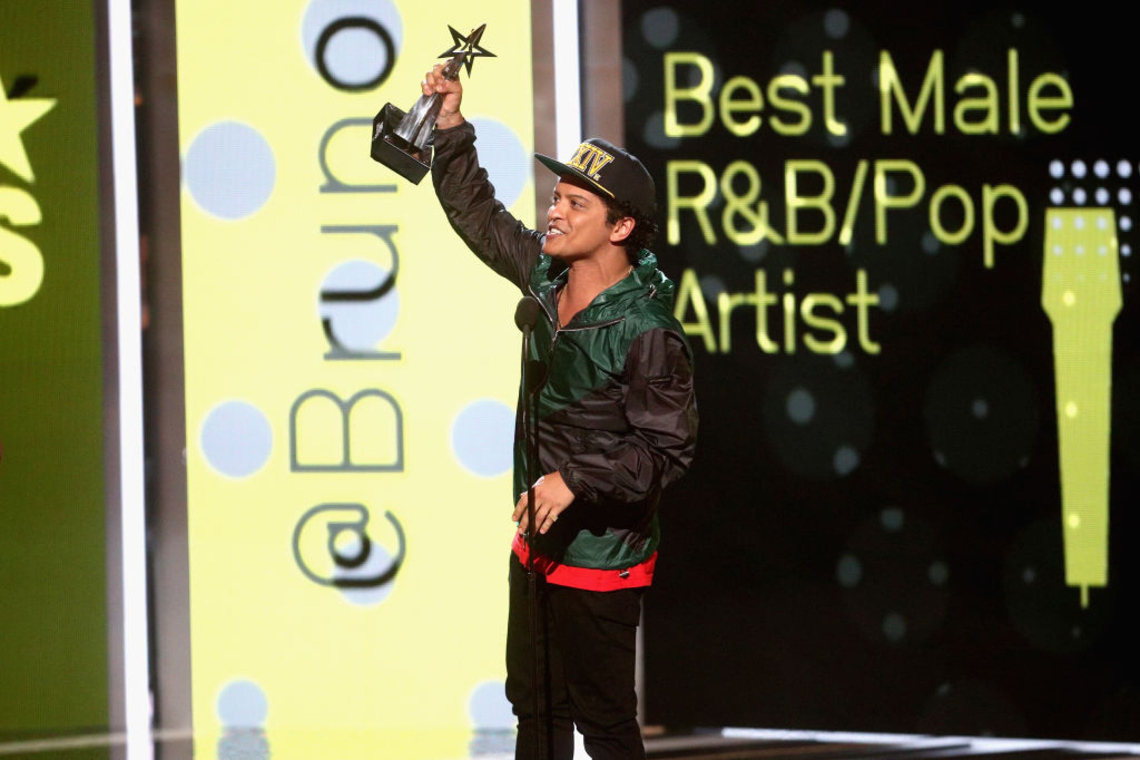 LOS ANGELES, CA - JUNE 25: Bruno Mars accepts the award for Best Male R&B/Pop Artist onstage at 2017 BET Awards at Microsoft Theater on June 25, 2017 in Los Angeles, California. (Photo by Frederick M. Brown/Getty Images )