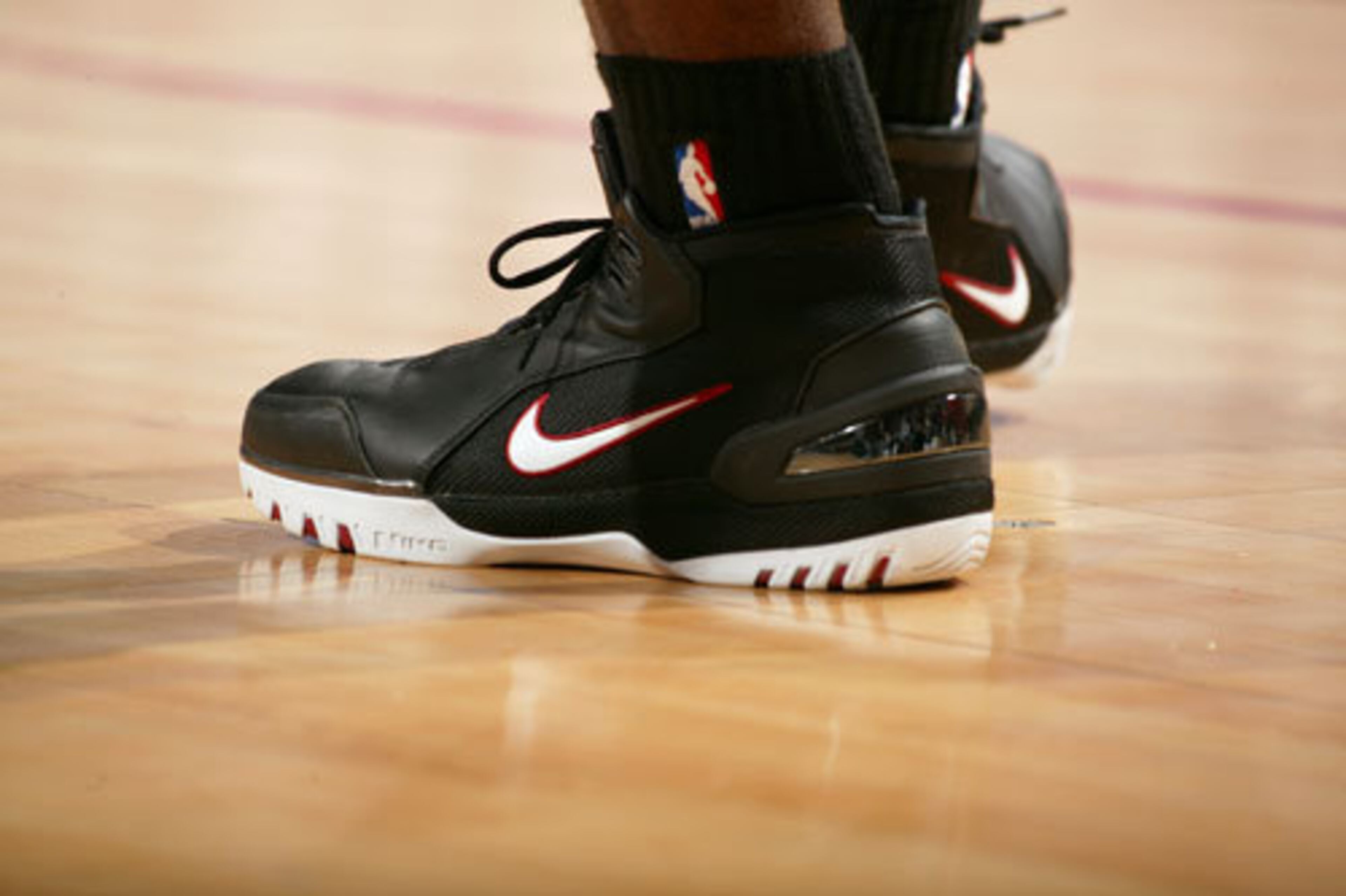 LeBron James wears his original Air Zoom Generation sneakers by Nike in 2003.