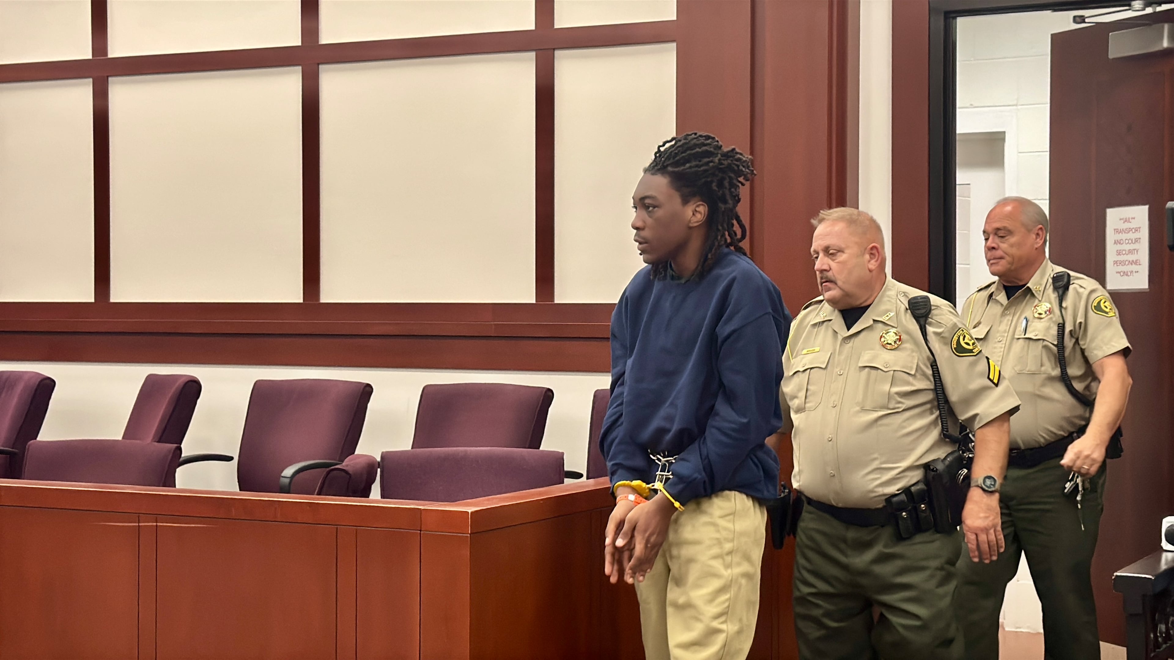 Denzelle D. Willis Jr., 14, entering Houston County Superior Court on Thursday, where he was arraigned on aggravated assault and other charges in connection with the shooting and wounding of a fellow Warner Robins High School student on Wednesday. (Joe Kovac Jr./AJC)