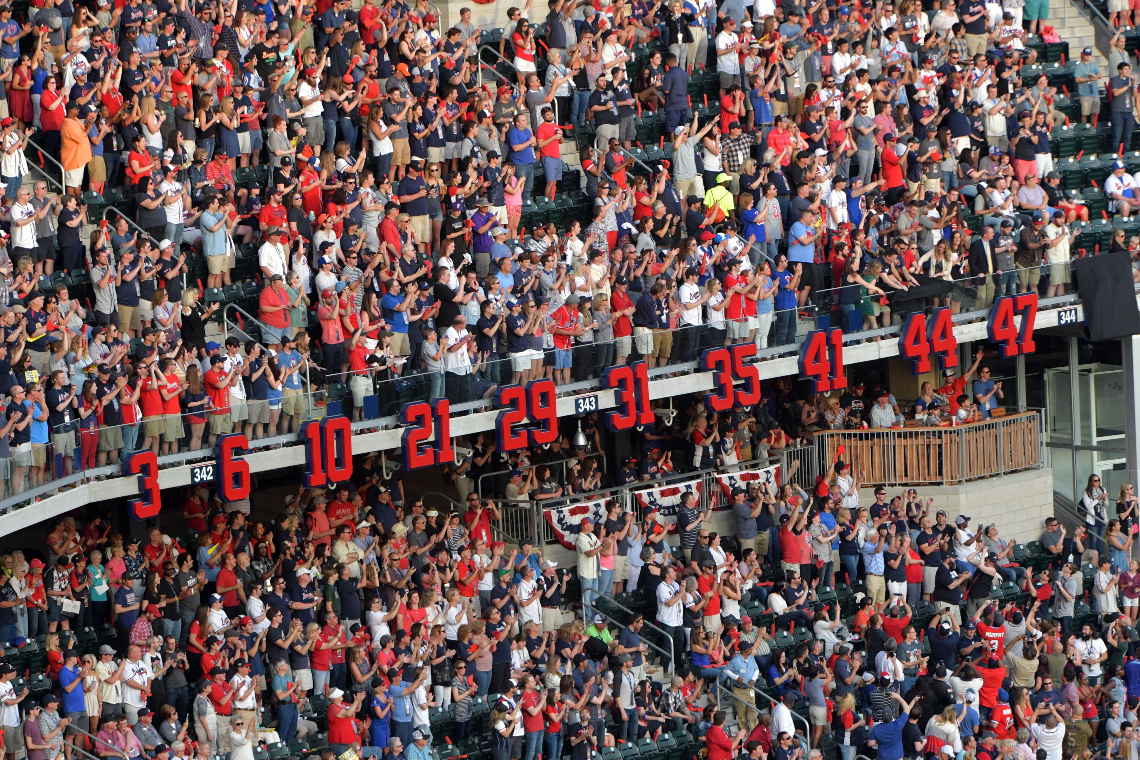 Braves legends numbers are unveiled in the new stadium before the Atlanta Braves play the San Diego Padres in the season opener in the new SunTrust Park Friday, April 14, 2017. HYOSUB SHIN / AJC