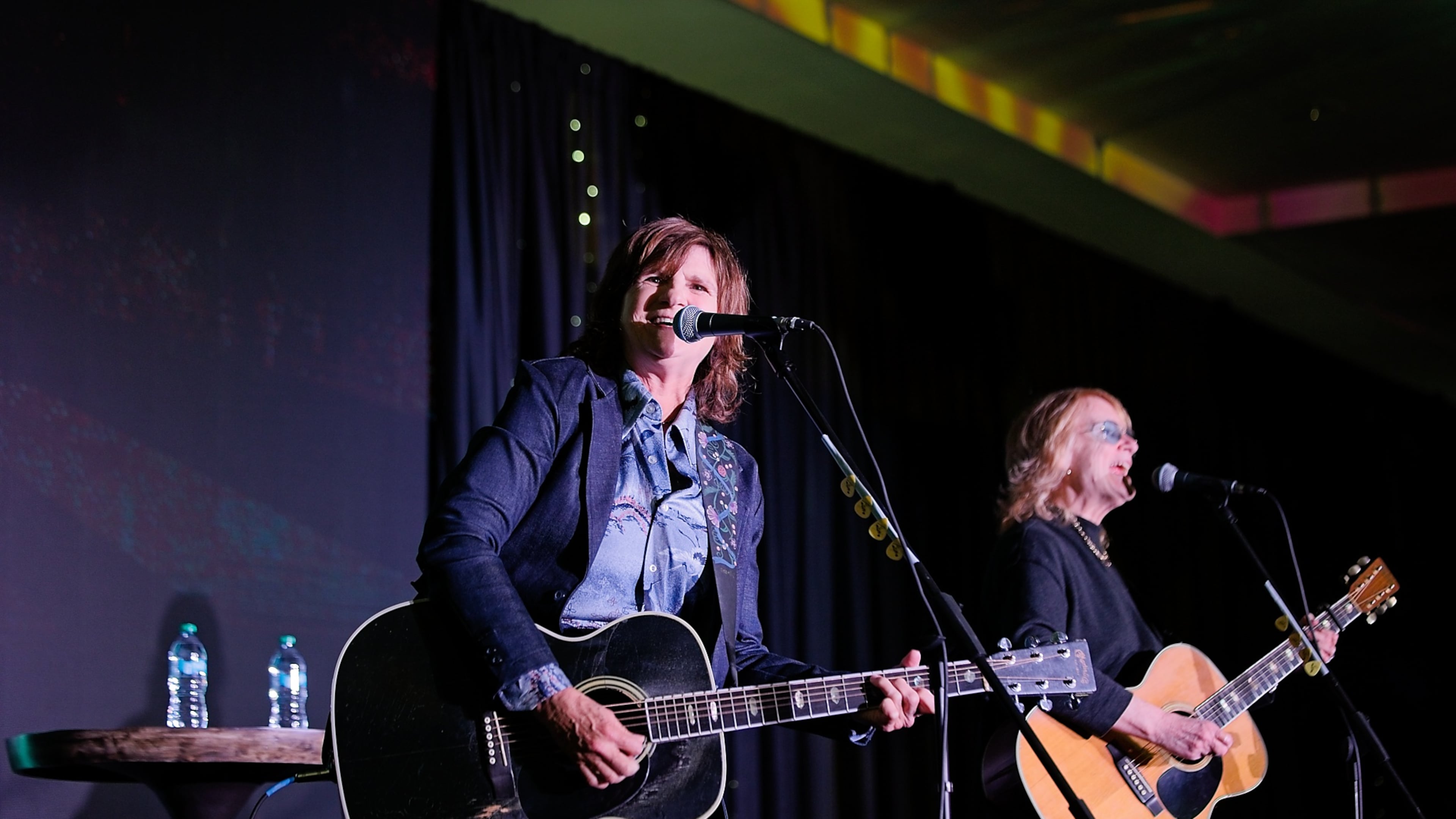 Amy Ray (left) and Emily Saliers, better known as Indigo Girls, first performed on the Decatur Square 40 years ago. They have returned to that stage many times over the years. (Courtesy WABE)